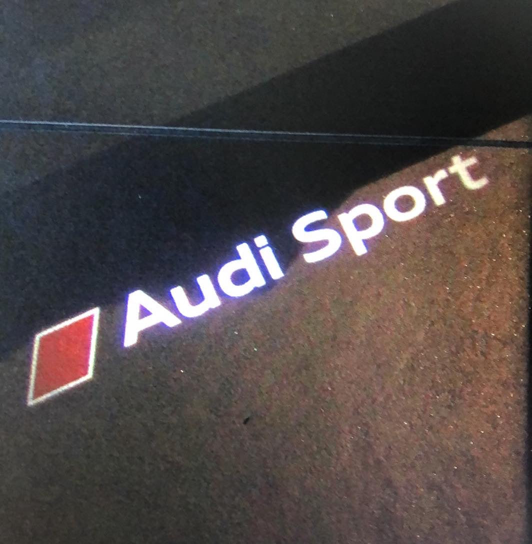 AUDI SPORT LOGO PROJECTOT LIGHTS Nr.69 (quantity 1 = 2 Logo Films /2 door lights)