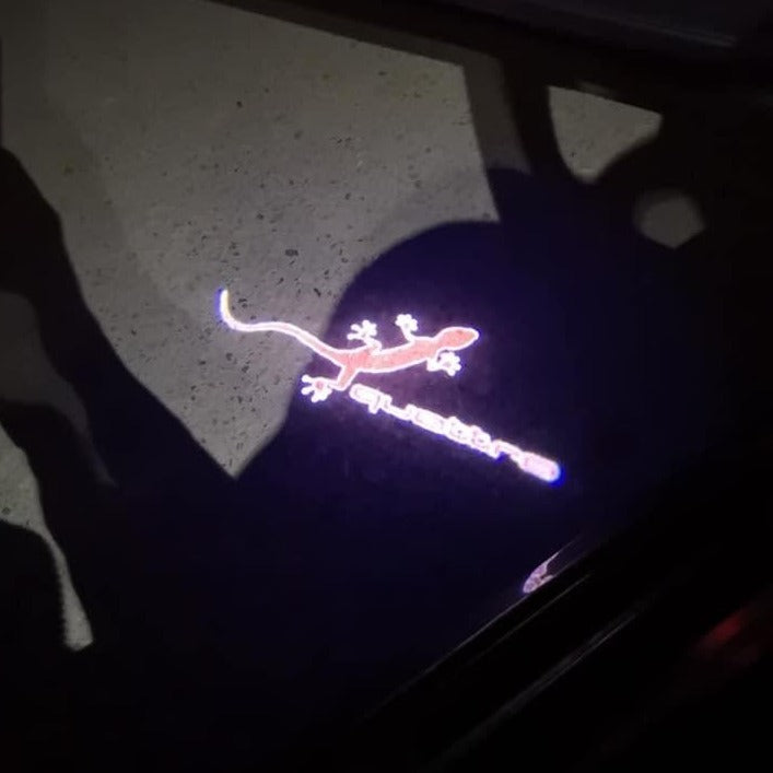 AUDI QUATTRO GECKO LOGO PROJECTOT LIGHTS Nr.61 (quantity 1 = 2 Logo Films /2 door lights)