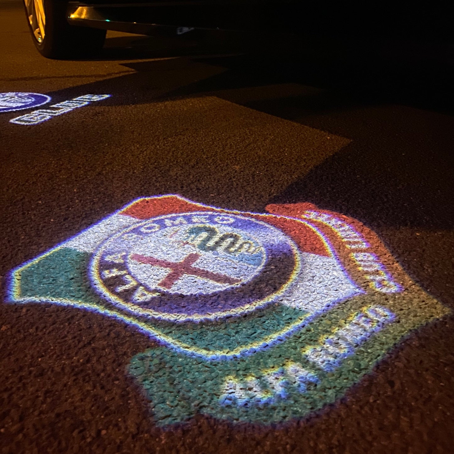 Alfa Romeo ORIGINAL Multicolour Logo PROJECTOT LIGHTS Nr.89 (quantity 1 = 2 Logo Film / 2 door lights)