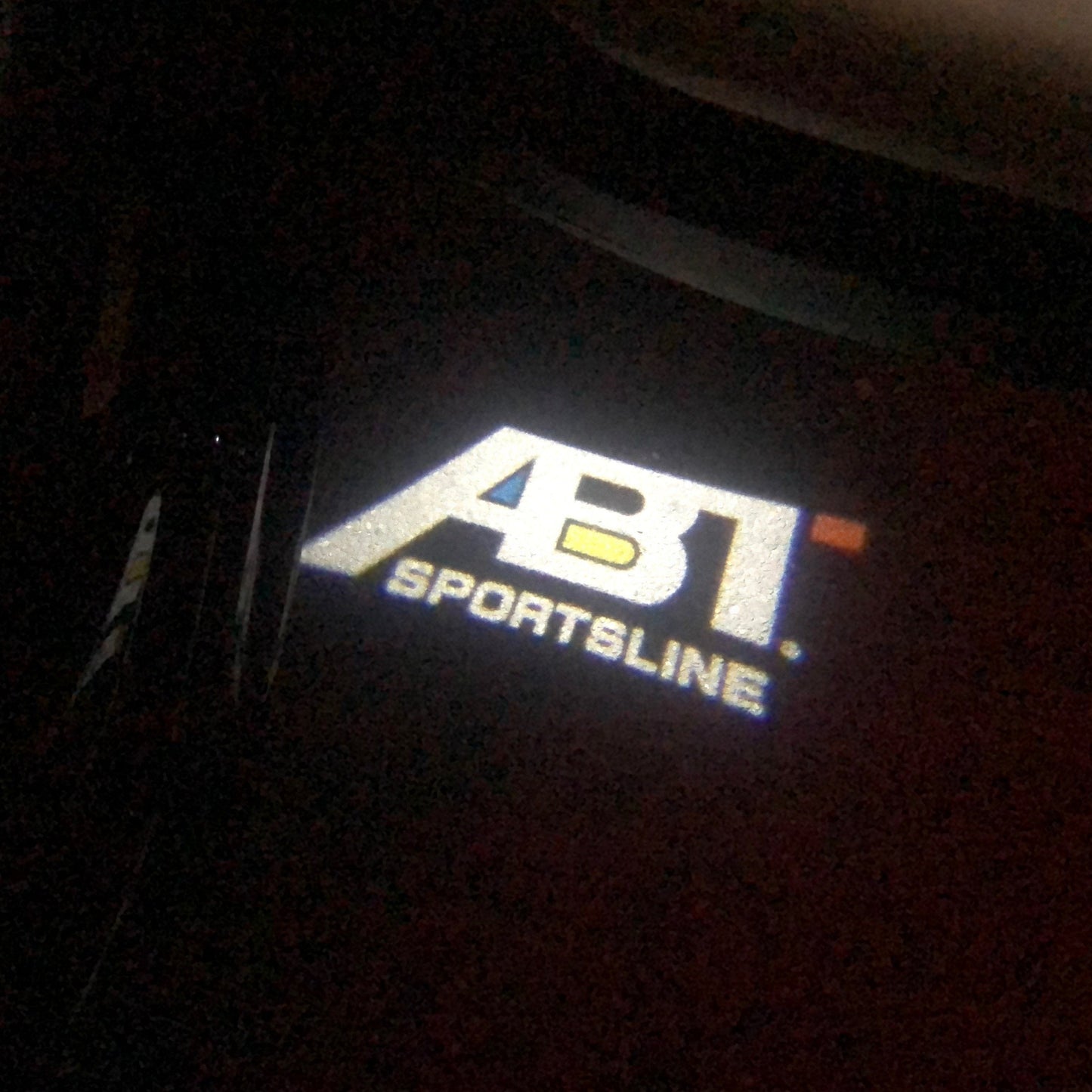 AUDI ABT LOGO PROJECTOT LIGHTS Nr.124 (quantity 1 = 2 Logo Film &2 door lights)