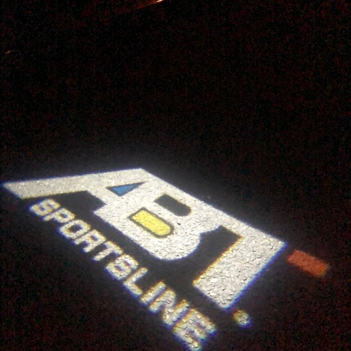 AUDI ABT LOGO PROJECTOT LIGHTS Nr.124 (quantity 1 = 2 Logo Film &2 door lights)