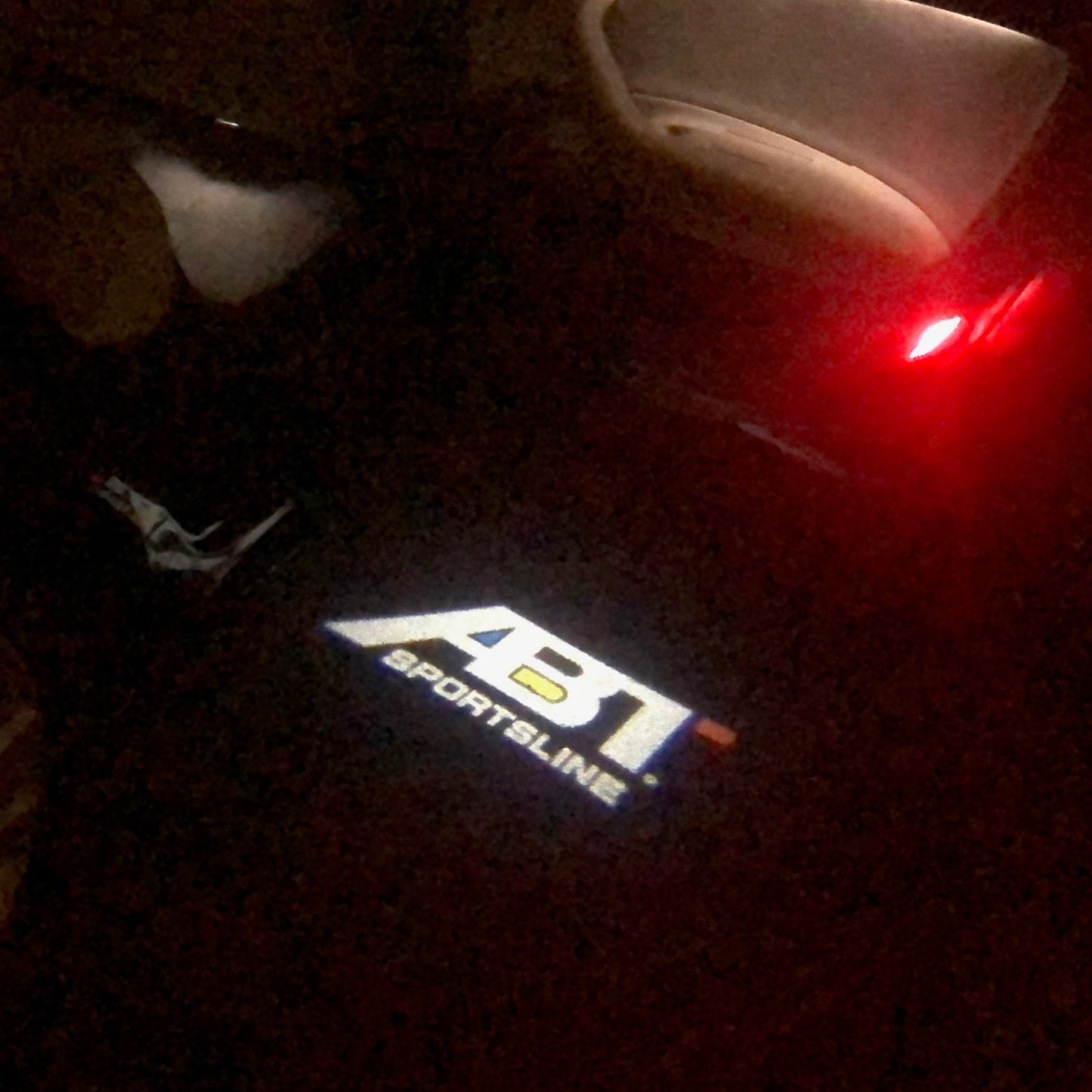 AUDI ABT LOGO PROJECTOT LIGHTS Nr.124 (quantity 1 = 2 Logo Film &2 door lights)