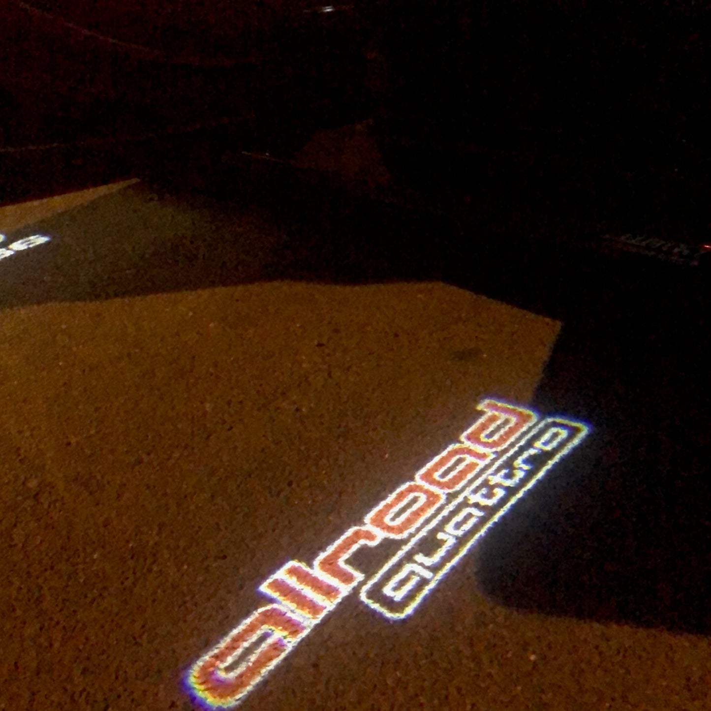 AUDI ALLROAD LOGO PROJECTOT LIGHTS Nr.153 (quantity 1 = 2 Logo Films /2 door lights)
