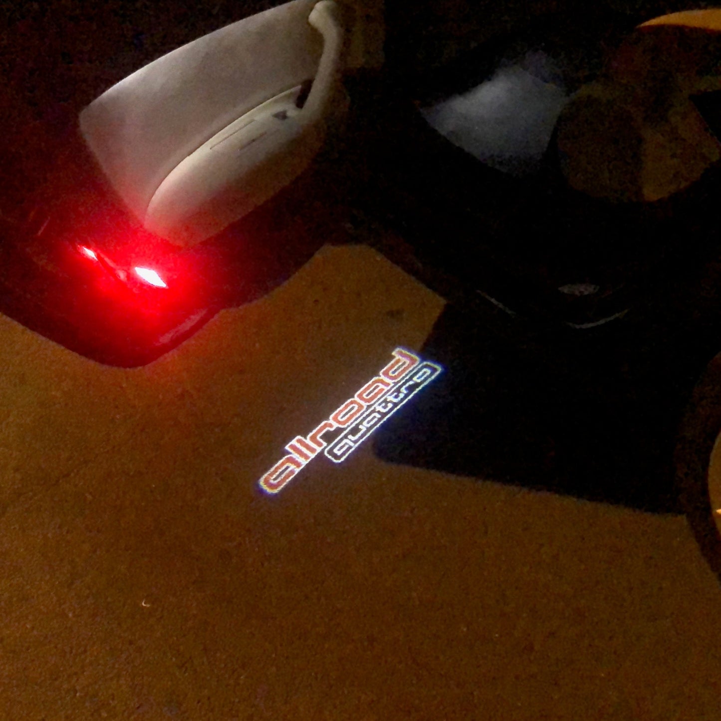 AUDI ALLROAD LOGO PROJECTOT LIGHTS Nr.153 (quantity 1 = 2 Logo Films /2 door lights)
