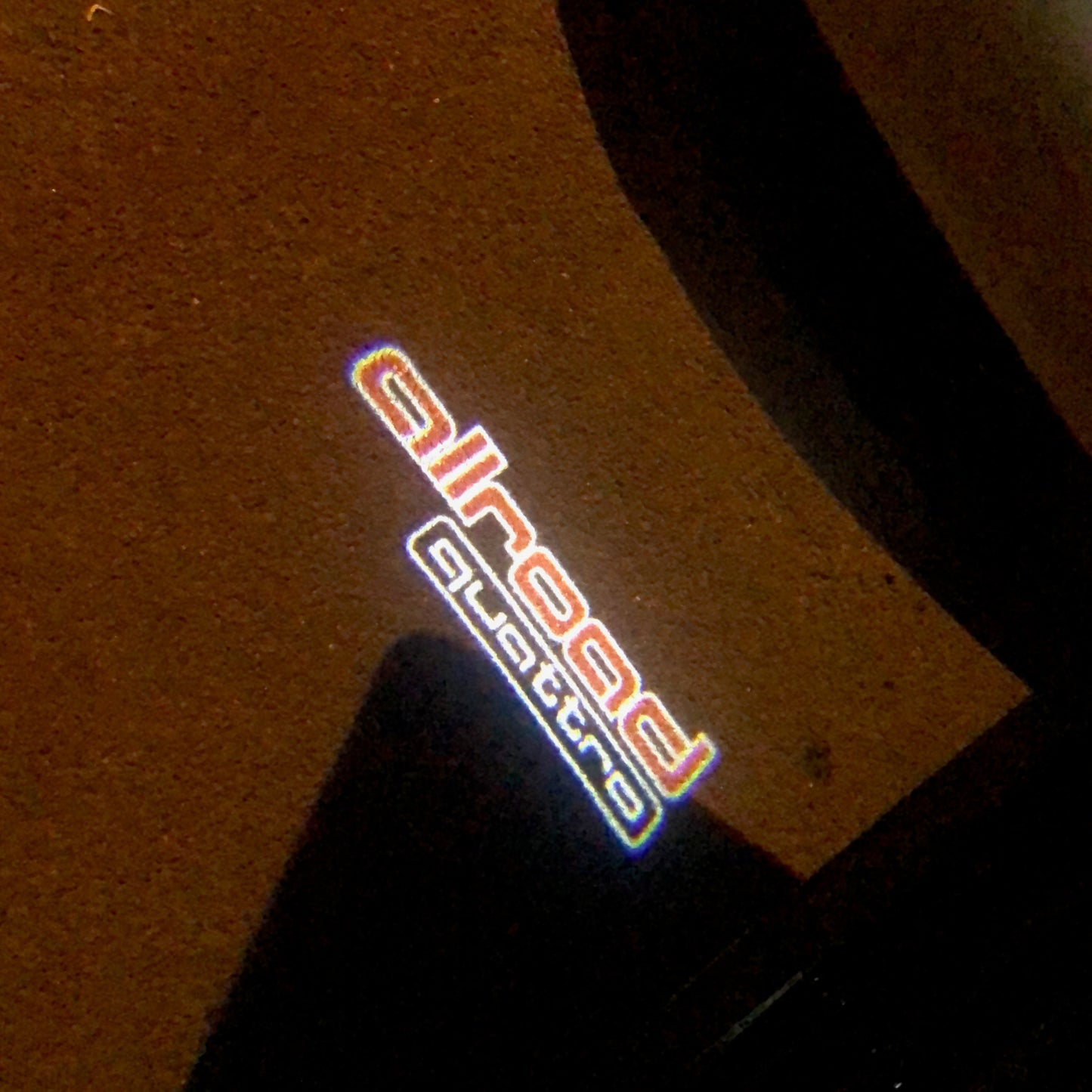 AUDI ALLROAD LOGO PROJECTOT LIGHTS Nr.153 (quantity 1 = 2 Logo Films /2 door lights)