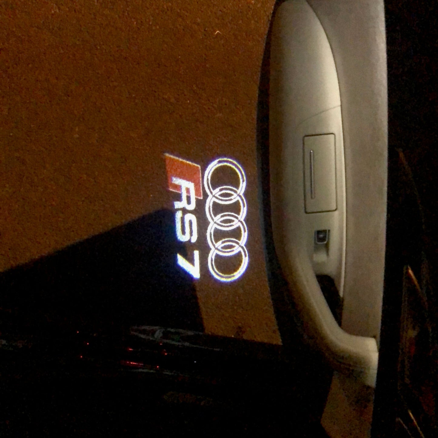 AUDI RS7 LOGO PROJECTOT LIGHTS Nr.138 (quantity 1 = 2 Logo Films /2 door lights)