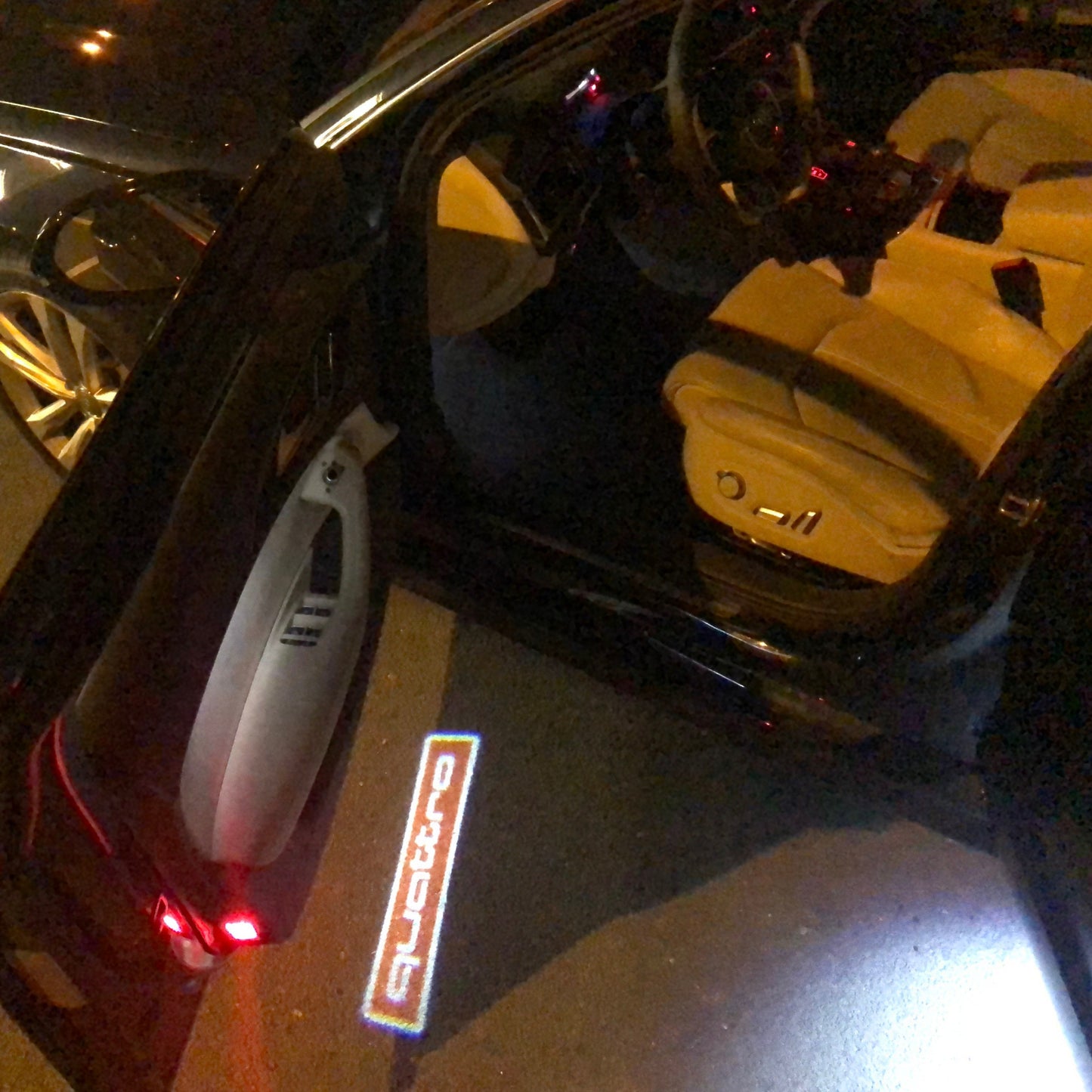 AUDI QUATTRO LOGO PROJECTOT LIGHTS Nr.83 (quantity 1 = 2 Logo Films /2 door lights)