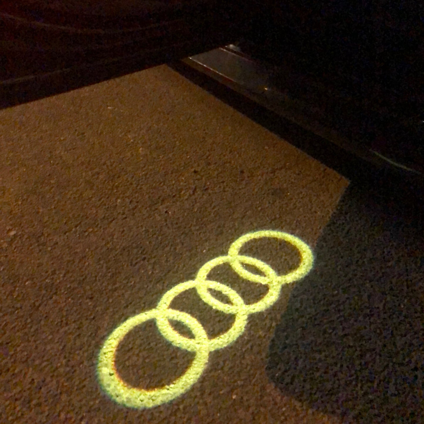 AUDI 4 RINGS LOGO PROJECTOT LIGHTS Nr.144 (quantity 1 = 2 Logo Films /2 door lights)