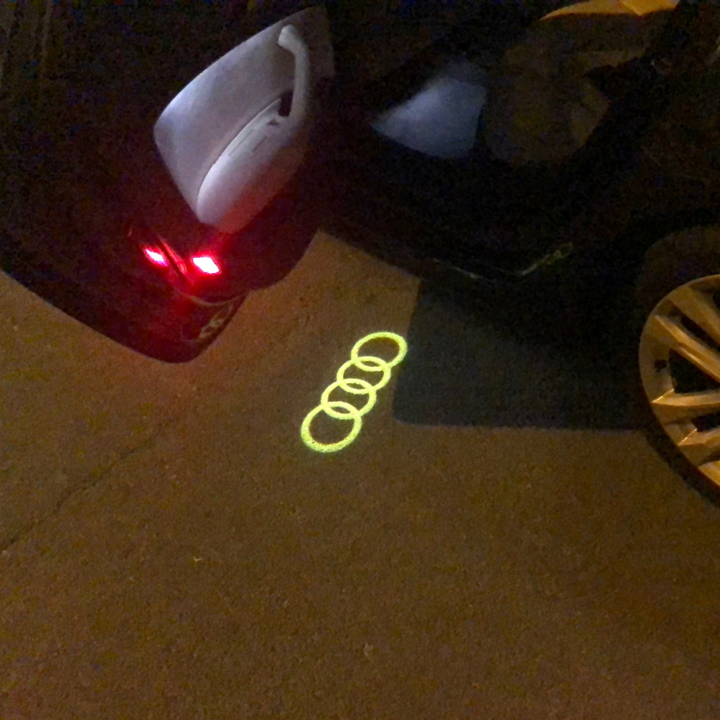 AUDI 4 RINGS LOGO PROJECTOT LIGHTS Nr.144 (quantity 1 = 2 Logo Films /2 door lights)