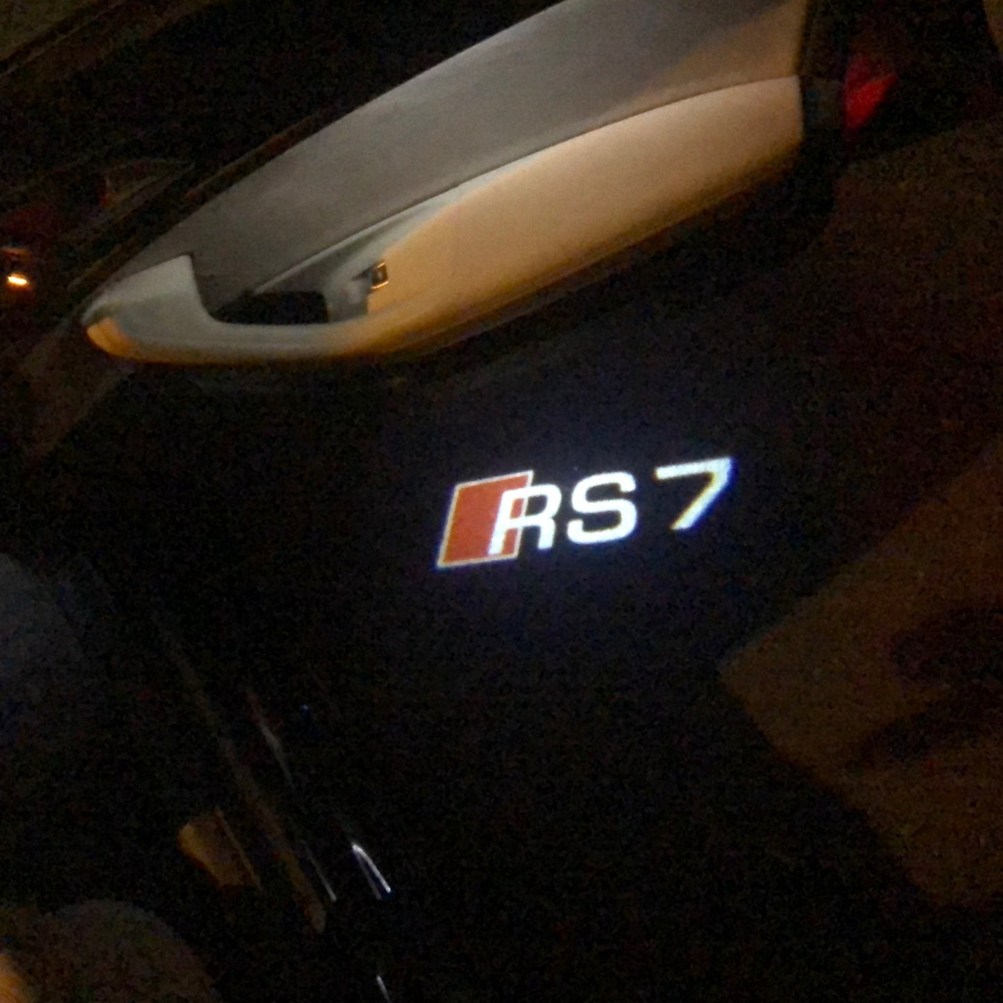 AUDI RS7 LOGO PROJECTOT LIGHTS Nr.56 (quantity 1 = 2 Logo Films /2 door lights)