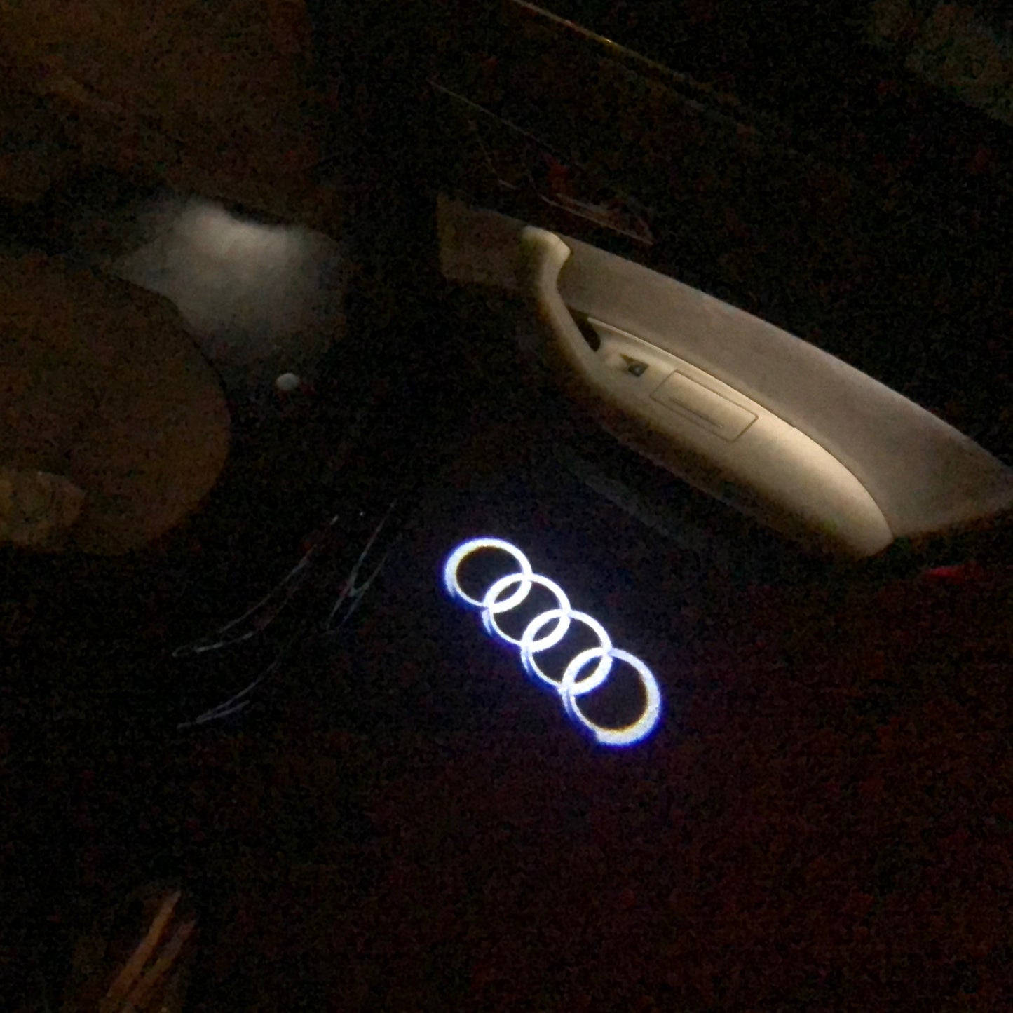AUDI 4 RINGS LOGO PROJECTOT LIGHTS Nr.04 (quantity 1 = 2 Logo Films /2 door lights)