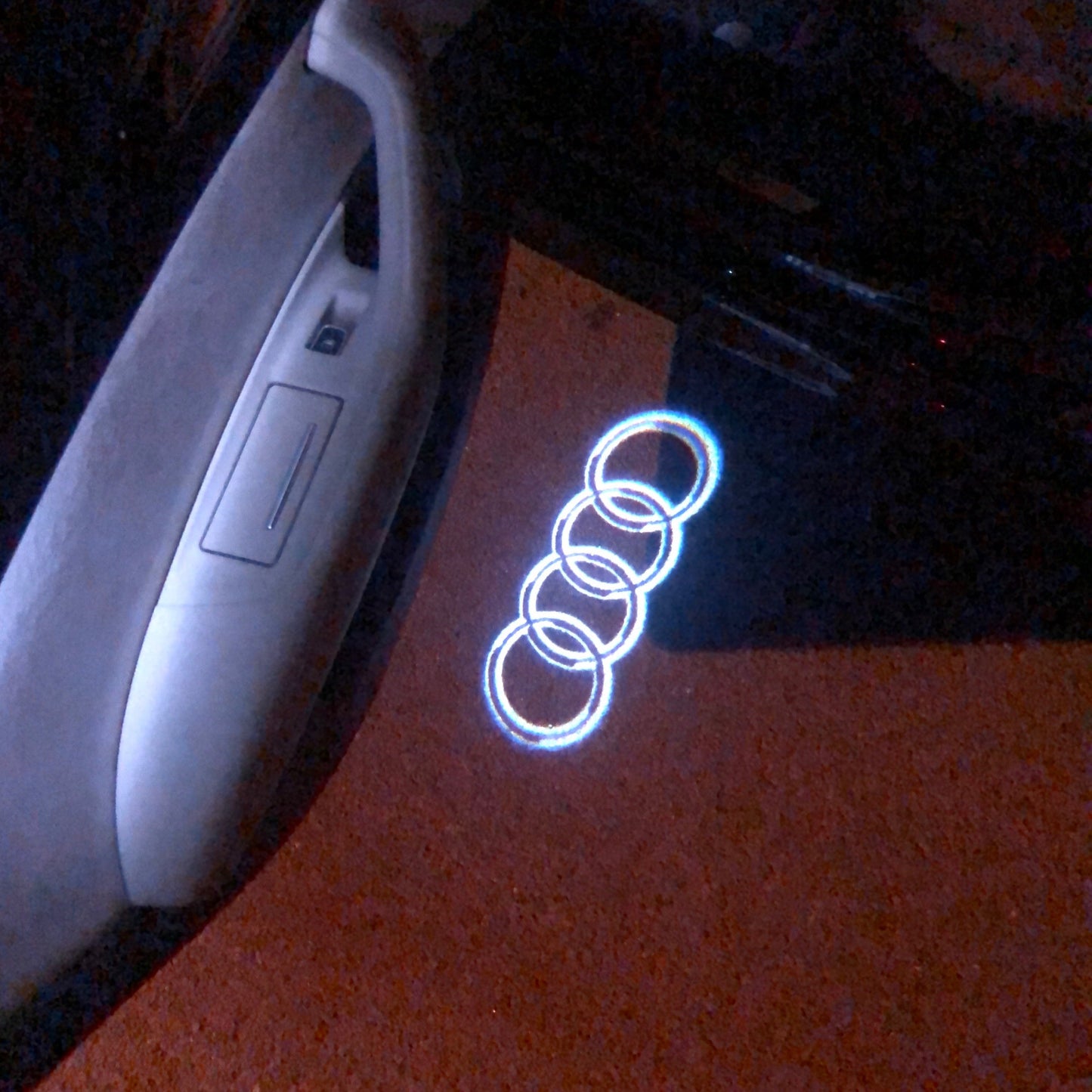 AUDI 4 RINGS LOGO PROJECTOT LIGHTS Nr.09 (quantity 1 = 2 Logo Films /2 door lights)