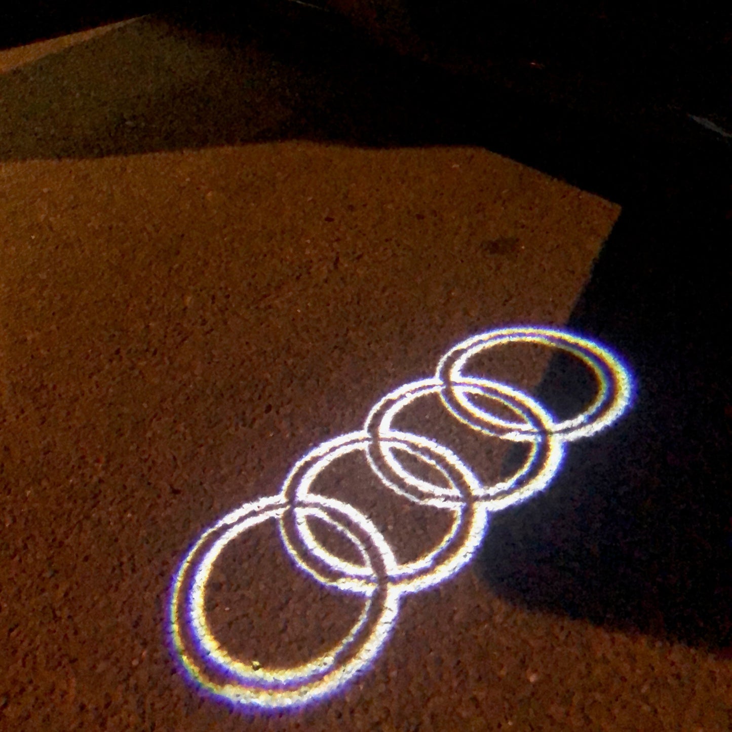 AUDI 4 RINGS LOGO PROJECTOT LIGHTS Nr.09 (quantity 1 = 2 Logo Films /2 door lights)