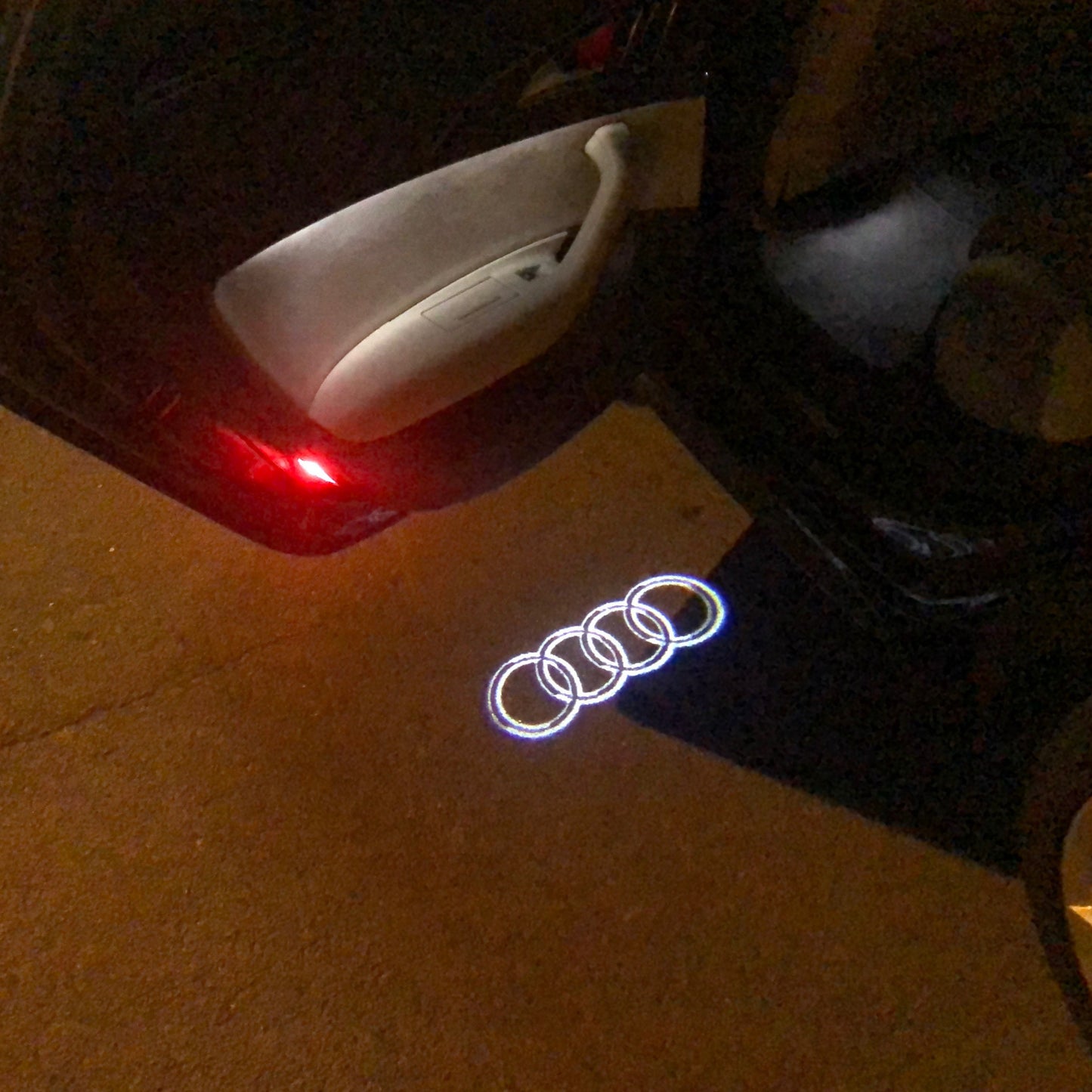 AUDI 4 RINGS LOGO PROJECTOT LIGHTS Nr.09 (quantity 1 = 2 Logo Films /2 door lights)