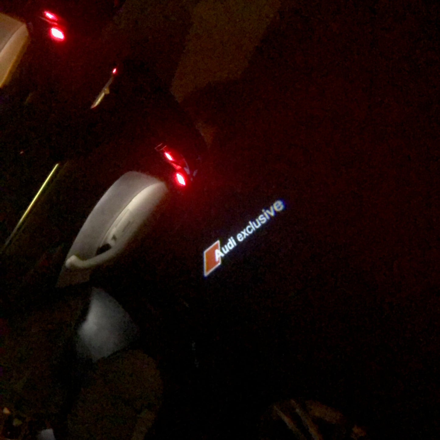 AUDI EXCLUSIVE LOGO PROJECTOT LIGHTS Nr.70 (quantity 1 = 2 Logo Films /2 door lights)
