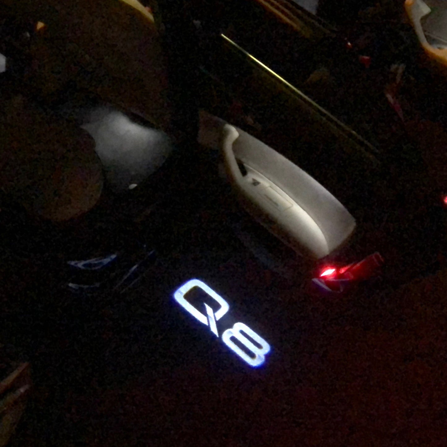 AUDI Q8 LOGO PROJECTOT LIGHTS Nr.102 (quantity 1 = 2 Logo Films /2 door lights)