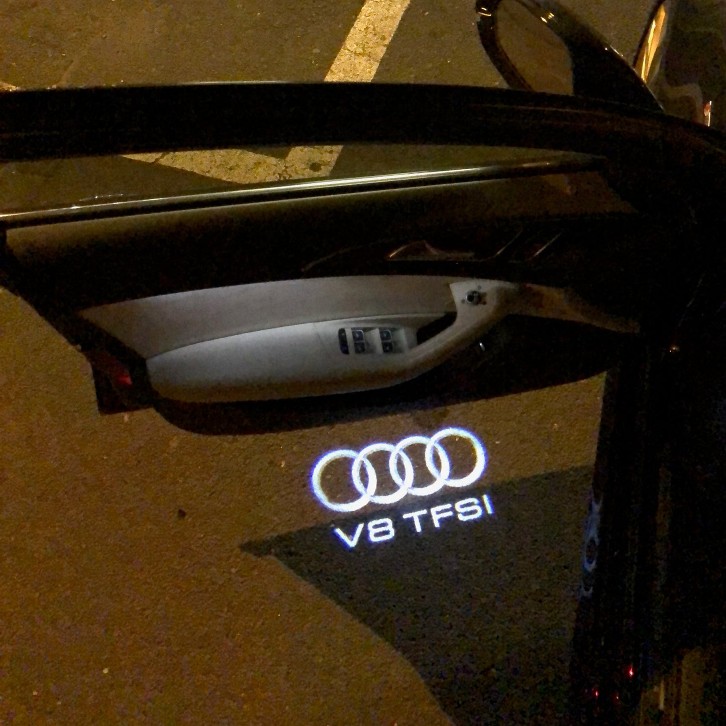 AUDI V8 TFSI LOGO PROJECTOT LIGHTS Nr.105 (quantity 1 = 2 Logo Films /2 door lights)