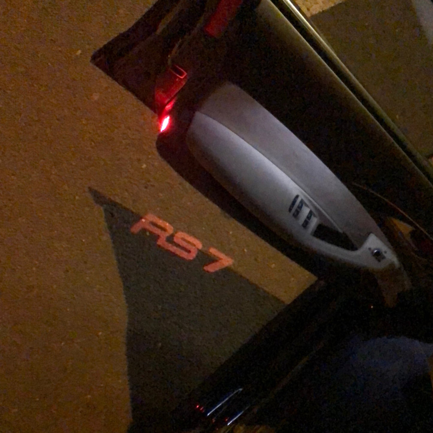 AUDI RS7 LOGO PROJECTOT LIGHTS Nr.142 (quantity 1 = 2 Logo Films /2 door lights)
