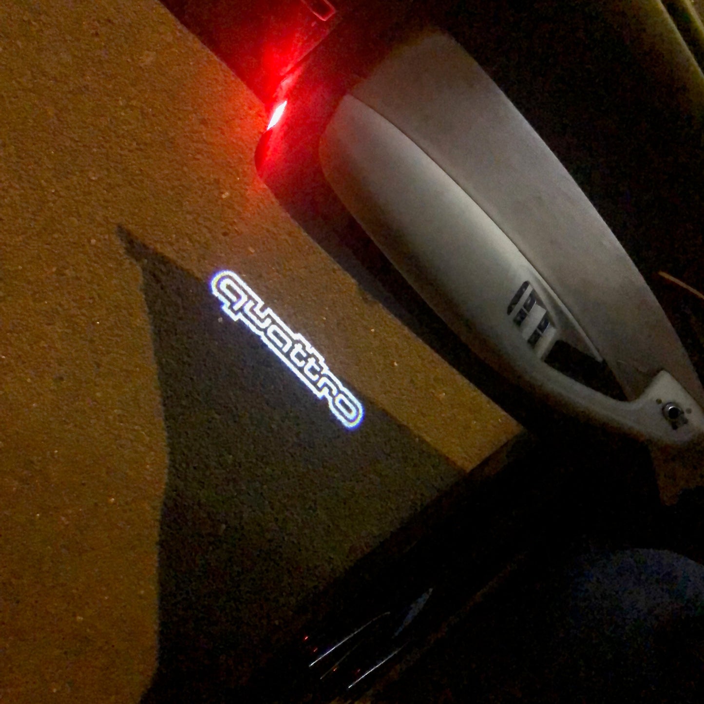 AUDI QUATTRO LOGO PROJECTOT LIGHTS Nr.108 (quantity 1 = 2 Logo Films /2 door lights)