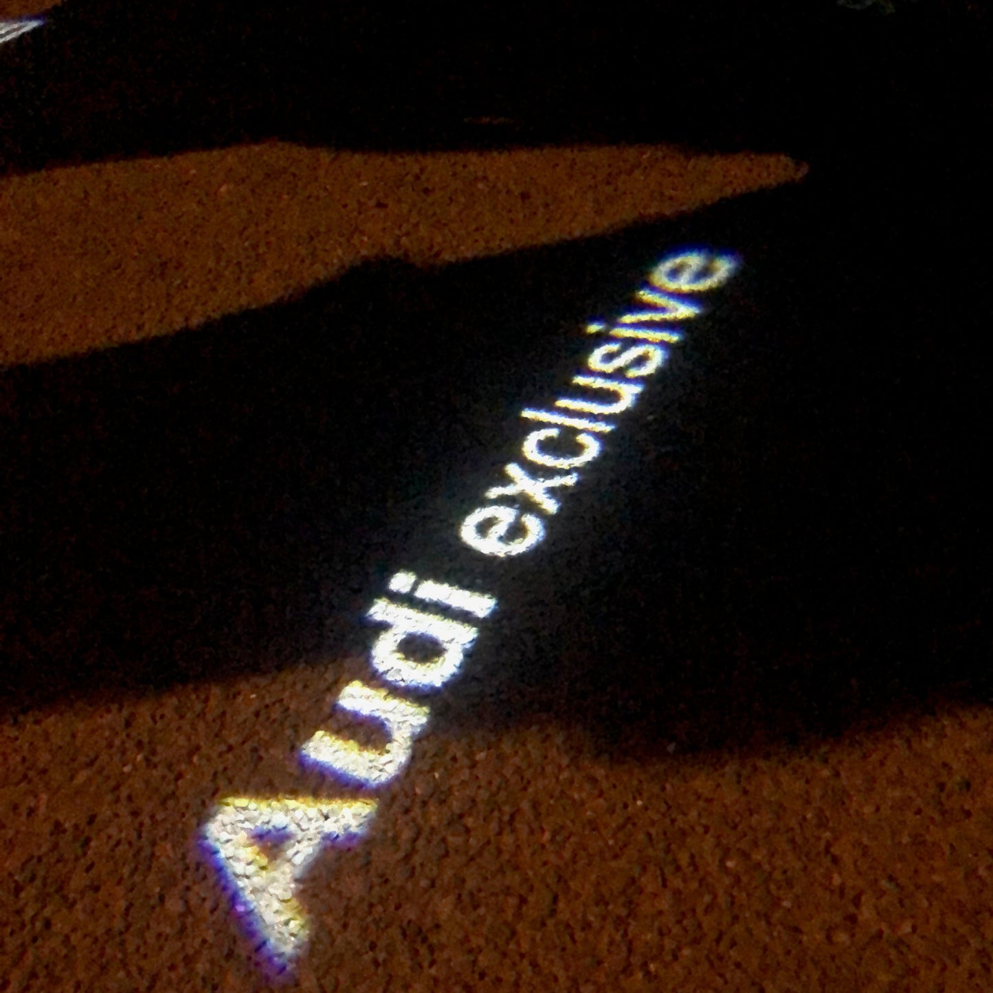 AUDI EXCLUSIVE LOGO PROJECTOT LIGHTS Nr.73 (quantity 1 = 2 Logo Films /2 door lights)