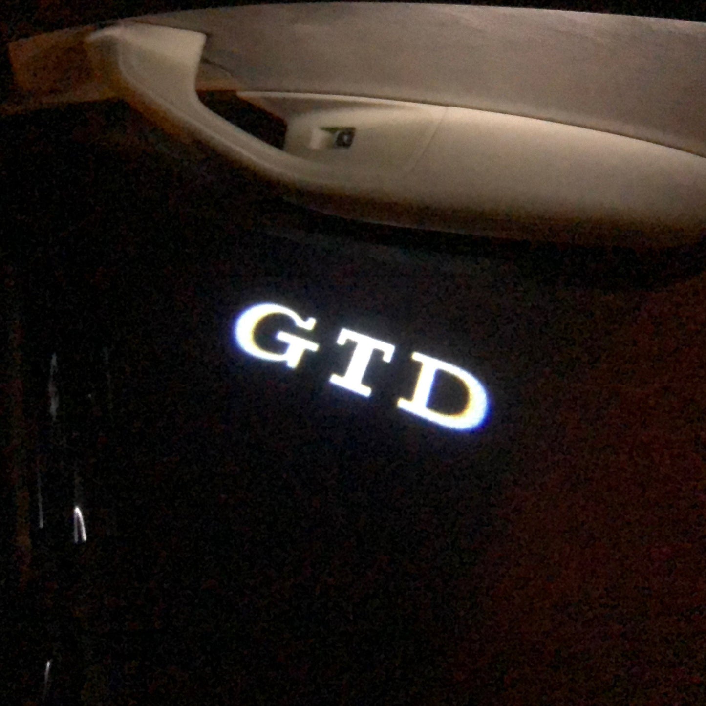 Volkswagen Door lights GTD Logo Nr. 30 ( quantity 1 = 2 logo film / 2 door lights)