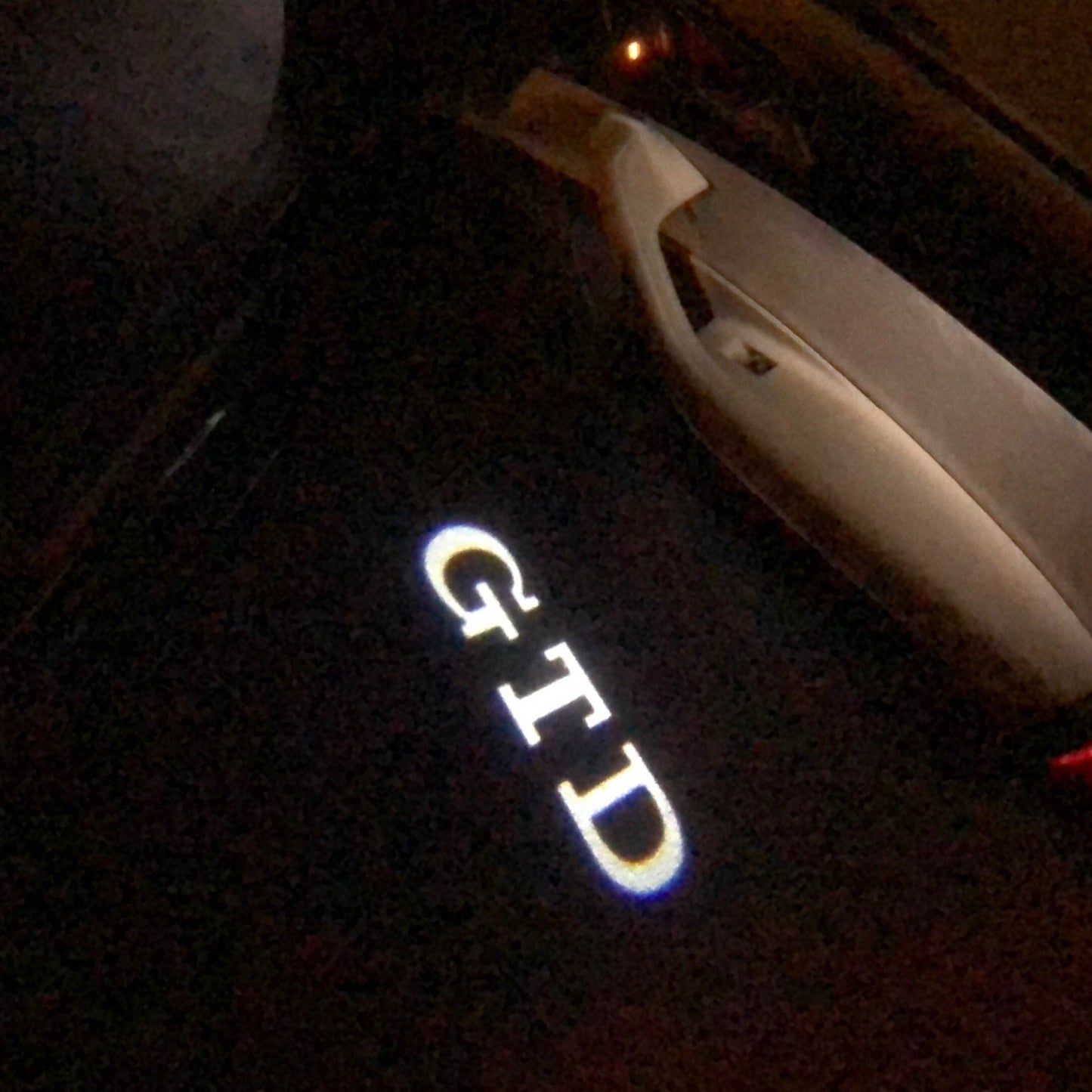 Volkswagen Door lights GTD Logo Nr. 30 ( quantity 1 = 2 logo film / 2 door lights)