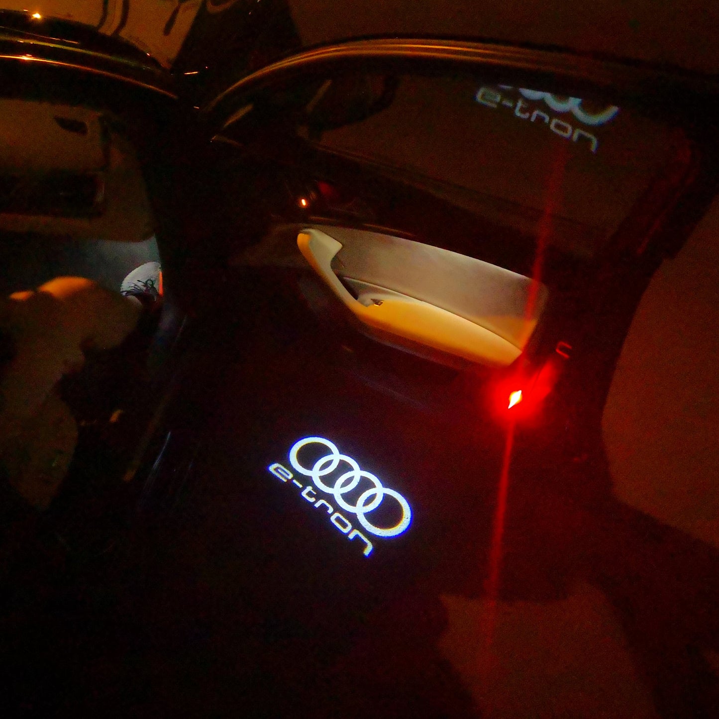 AUDI E-TRON LOGO PROJECTOT LIGHTS Nr.16 (quantity 1 = 2 Logo Films /2 door lights)