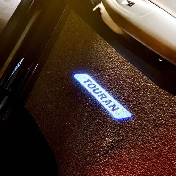 Volkswagen Door lights TOURAN Logo Nr. 176 ( quantity 1 = 2 logo film / 2 door lights)