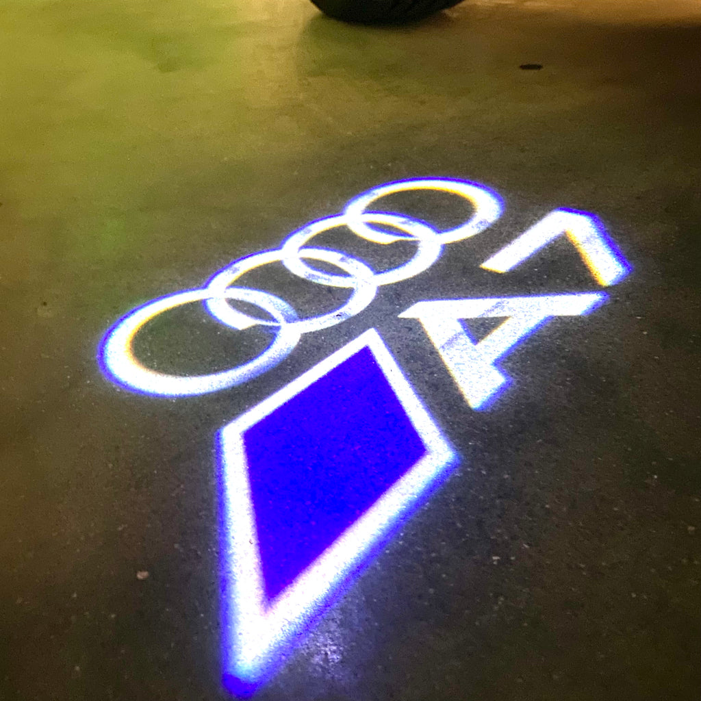 AUDI  A7 LOGO PROJECTOT LIGHTS Nr.12B11  (quantity 1 = 2 Logo Films /2 door lights）