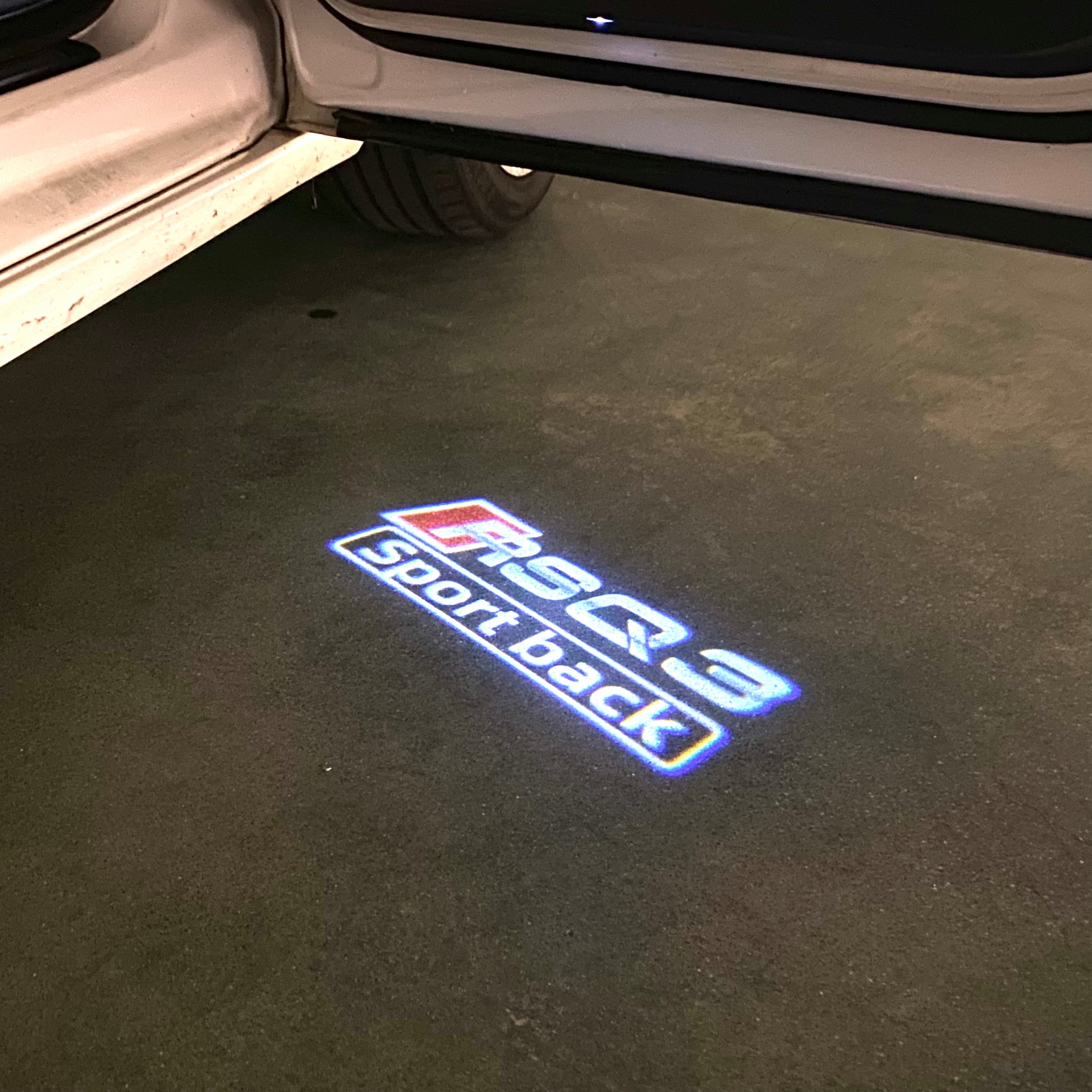 AUDI  RSQ3  LOGO PROJECTOT LIGHTS  (quantity 1 = 2 Logo Films /2 door lights）Nr.12B23