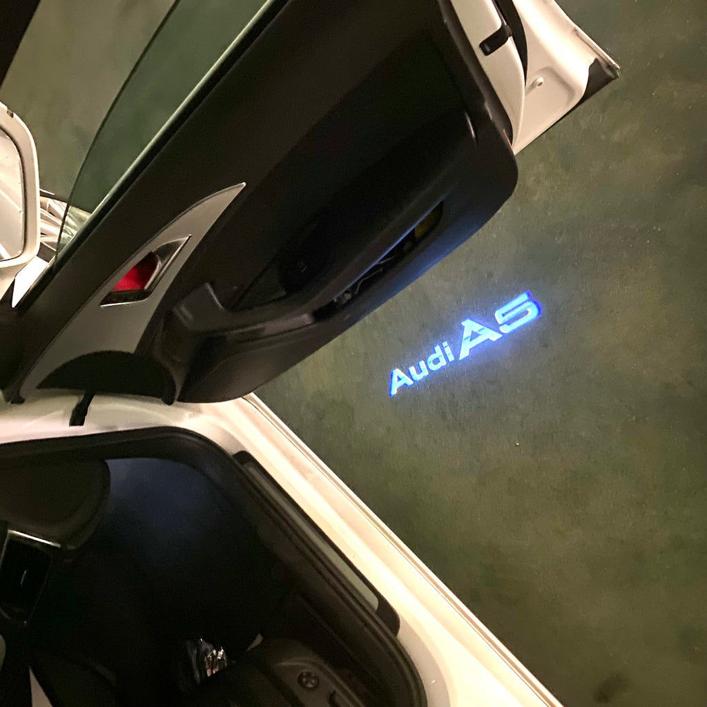 AUDI  A5 LOGO PROJECTOT LIGHTS  (quantity 1 = 2 Logo Films /2 door lights）Nr.12B78
