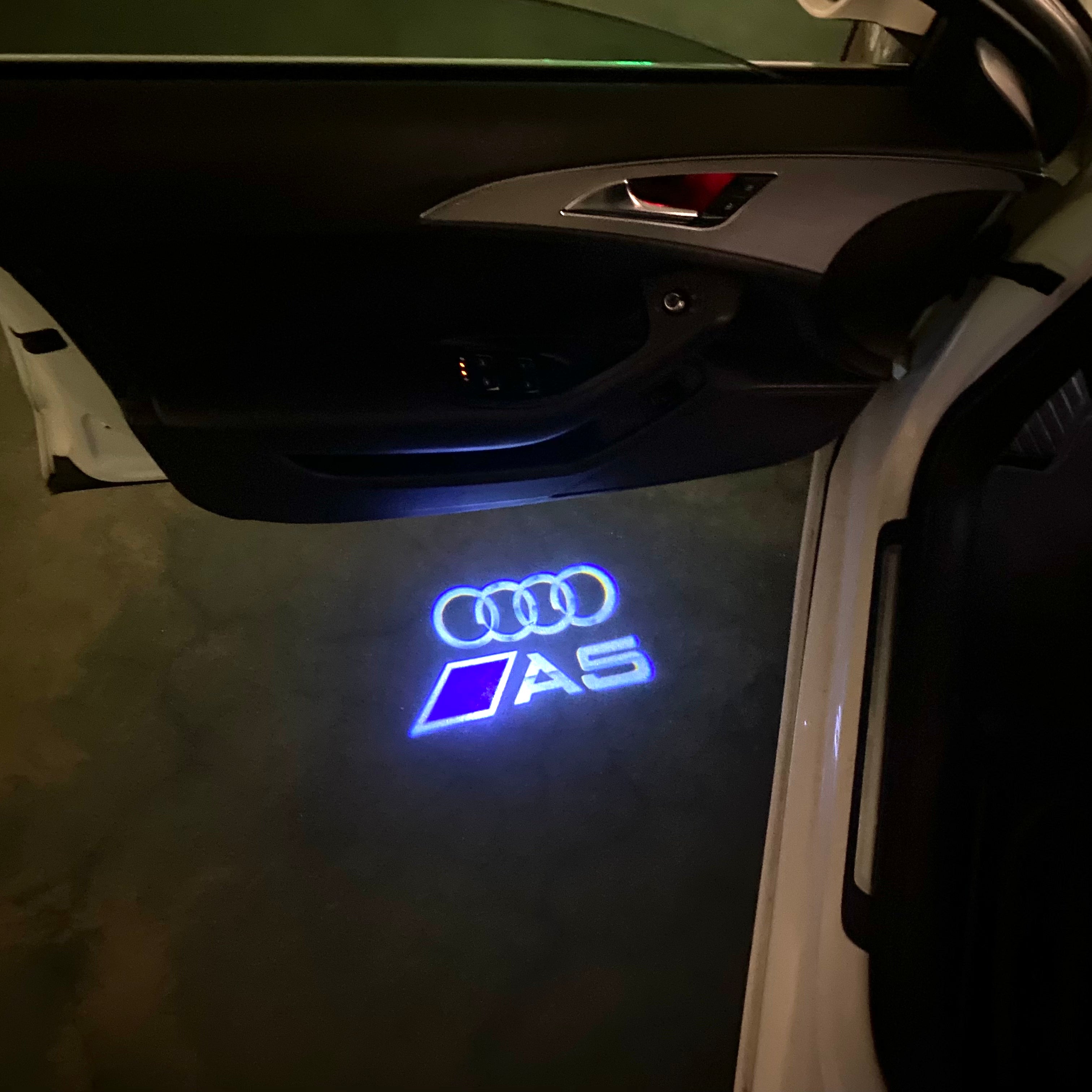 AUDI  A5  LOGO PROJECTOT LIGHTS  (quantity 1 = 2 Logo Films /2 door lights）Nr.12B101