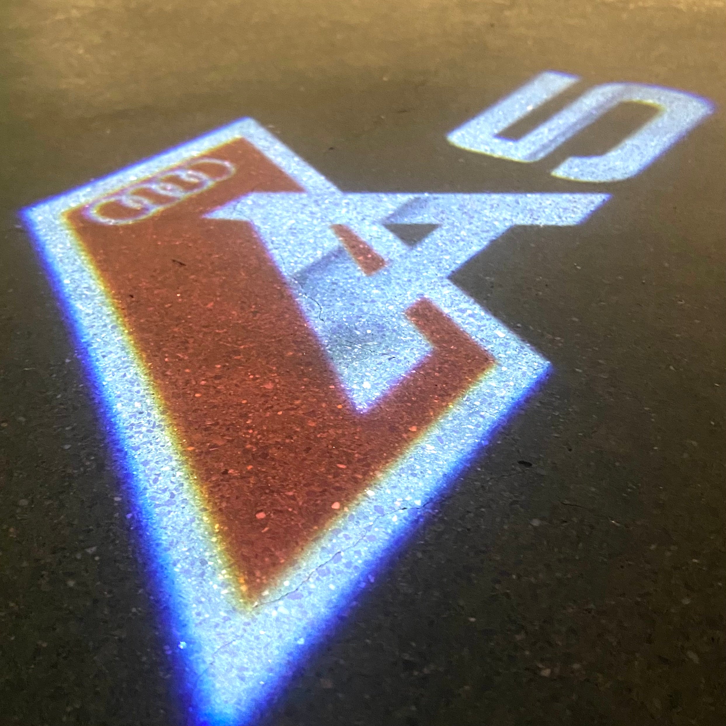 AUDI  A5  LOGO PROJECTOT LIGHTS  (quantity 1 = 2 Logo Films /2 door lights）Nr.12B97