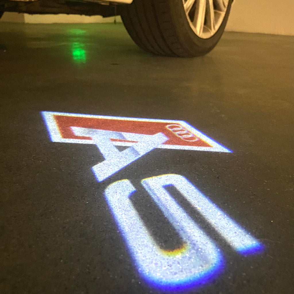 AUDI  A5  LOGO PROJECTOT LIGHTS  (quantity 1 = 2 Logo Films /2 door lights）Nr.12B97