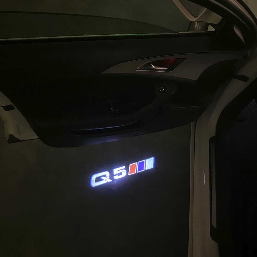 AUDI  Q5   LOGO PROJECTOT LIGHTS  (quantity 1 = 2 Logo Films /2 door lights）Nr.12B70