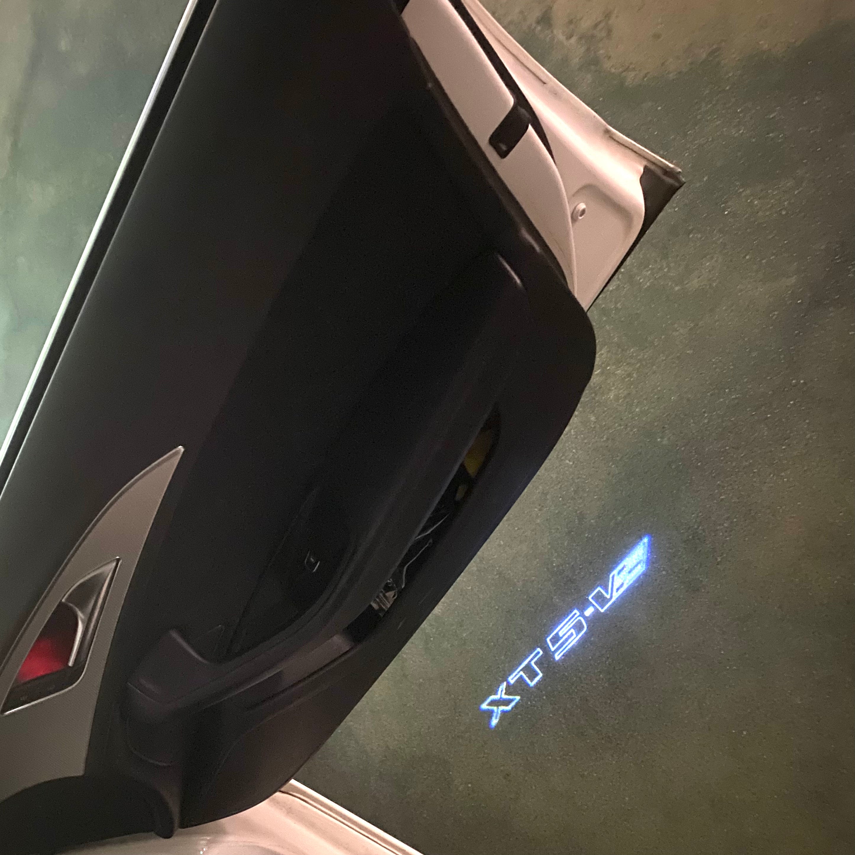 CADILLAC XTS LOGO PROJECTOT LIGHTS Nr.9780 (quantity 1 = 2 Logo Films /2 door lights）