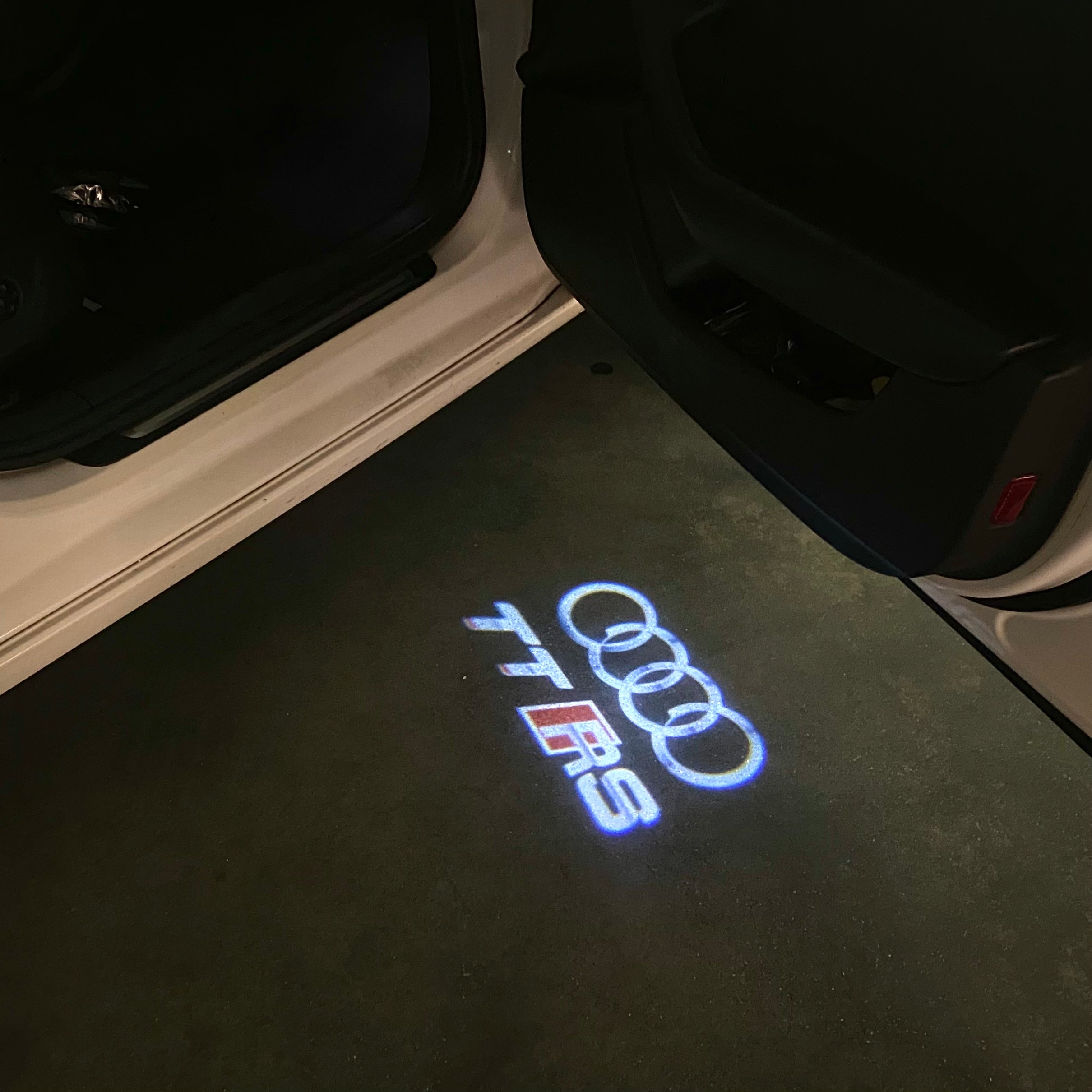 AUDI  TTRS LOGO PROJECTOT LIGHTS  (quantity 1 = 2 Logo Films /2 door lights）Nr.12B50