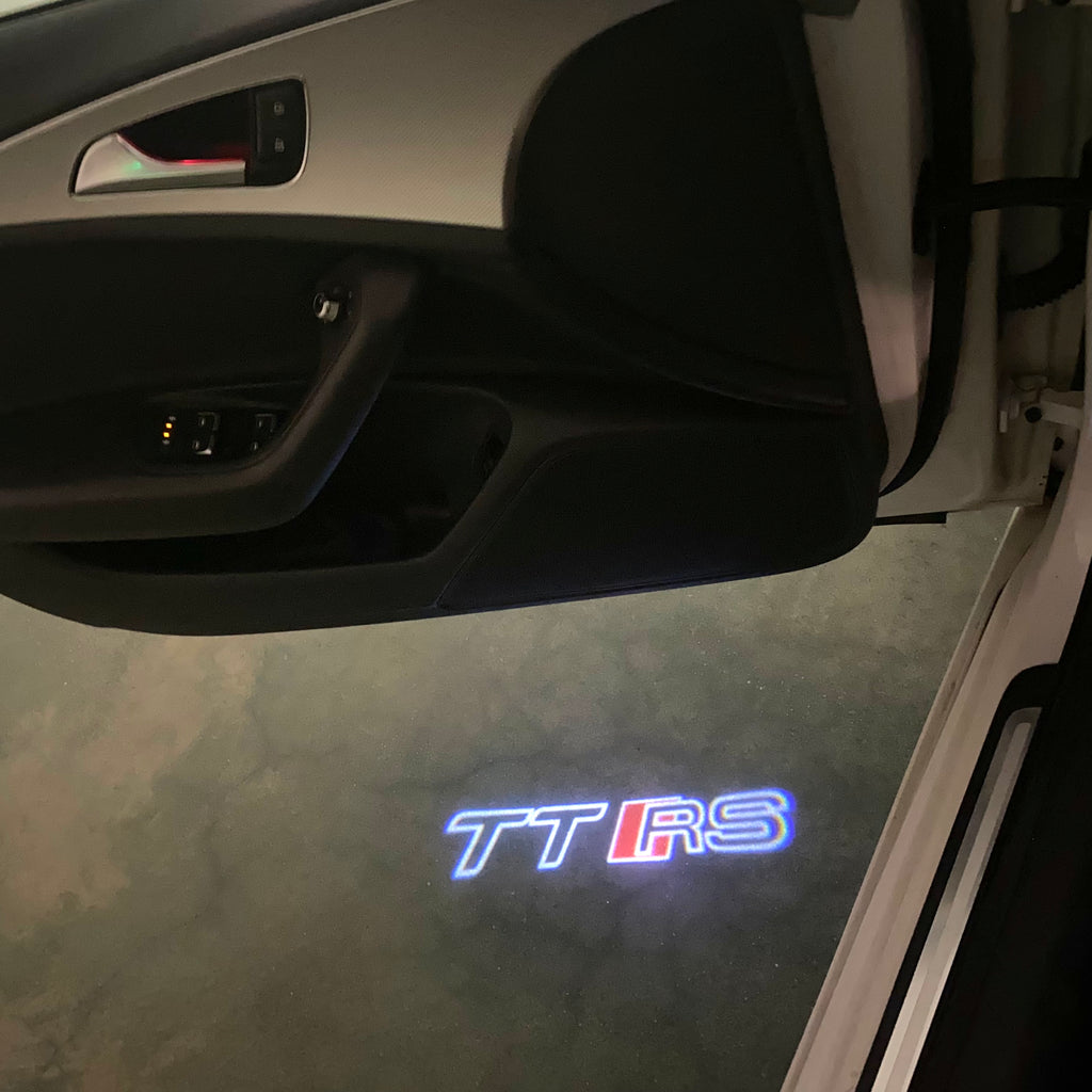 AUDI  TTRS LOGO PROJECTOT LIGHTS  (quantity 1 = 2 Logo Films /2 door lights）Nr.12B18
