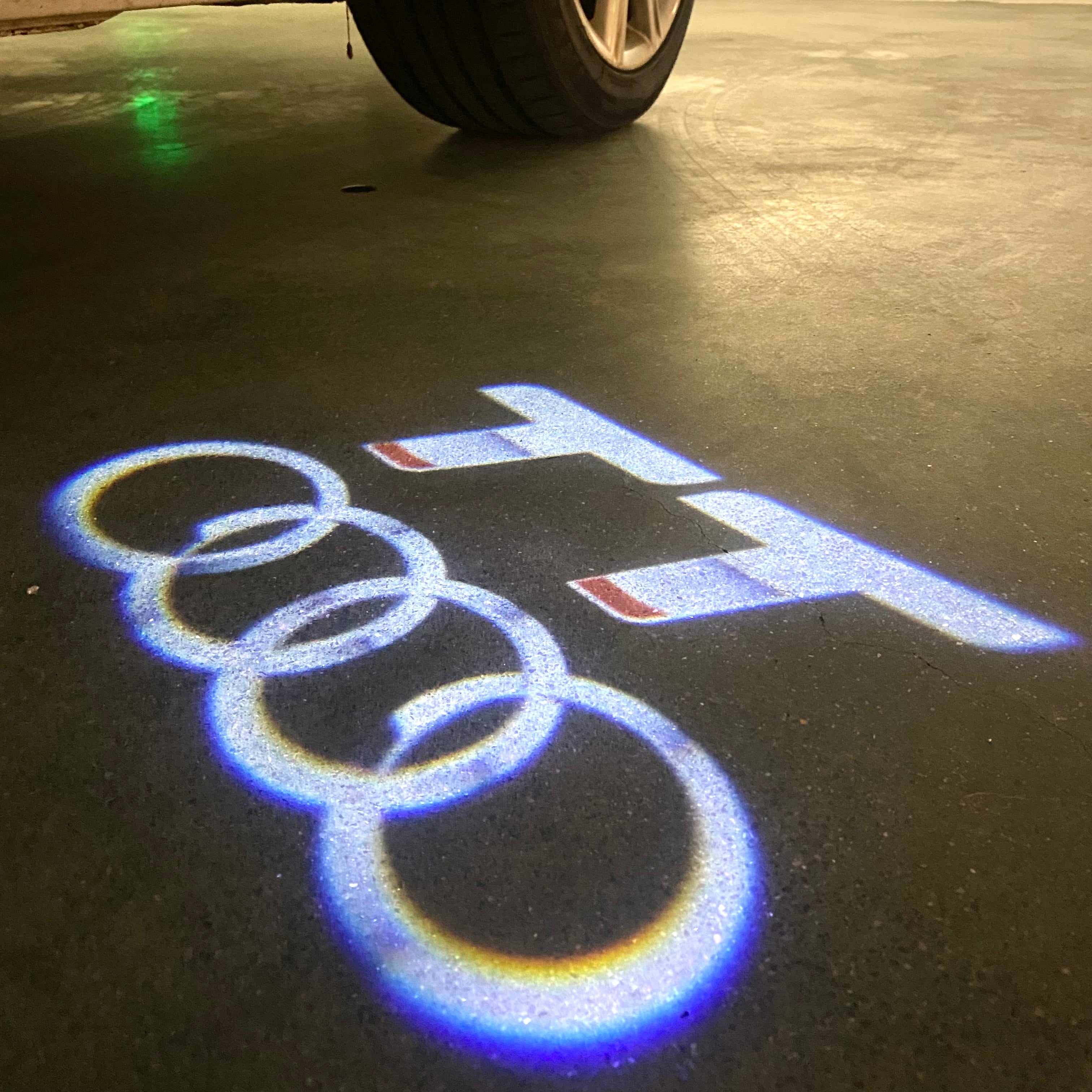AUDI  TT  LOGO PROJECTOT LIGHTS  (quantity 1 = 2 Logo Films /2 door lights）Nr.12B15
