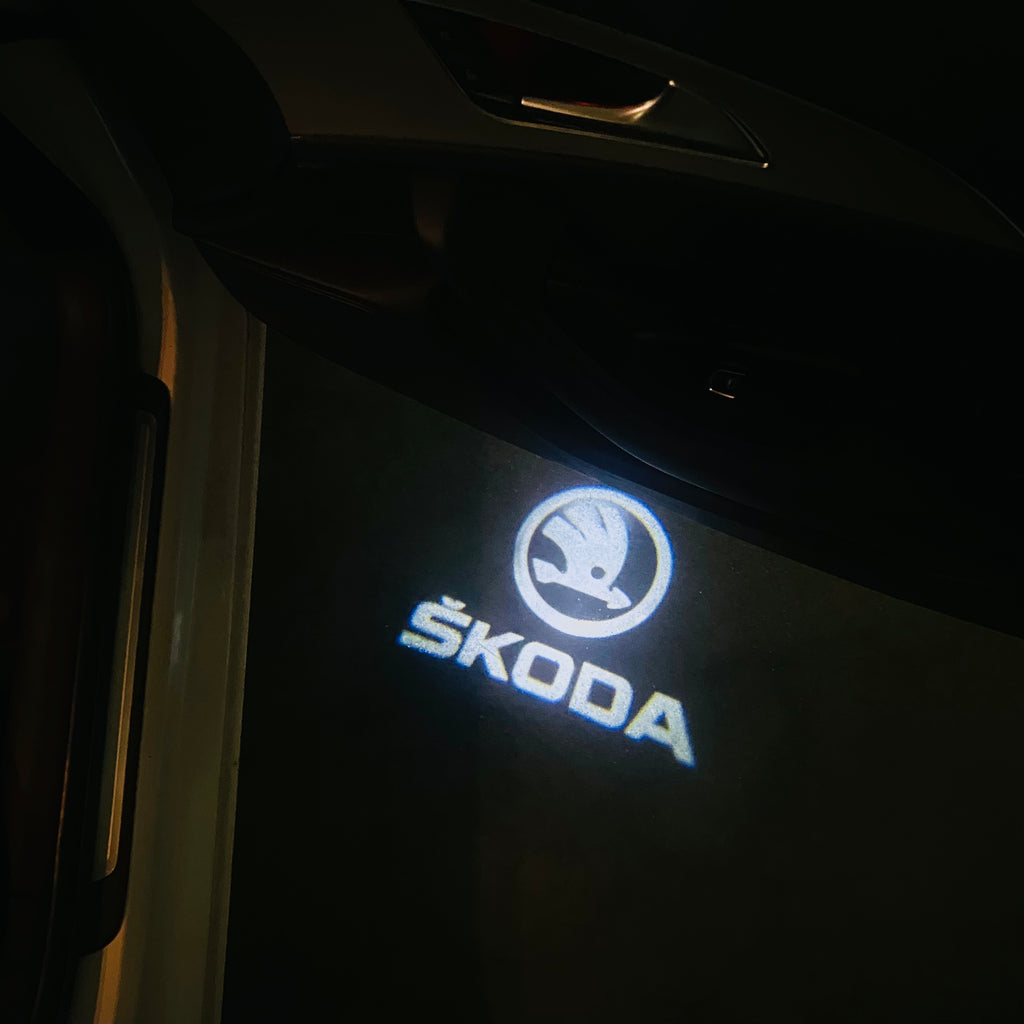 SKODA ORIGINAL LOGO PROJECTOT LIGHTS Nr.09(quantity  1 =  2 Logo Film /  2 door lights)
