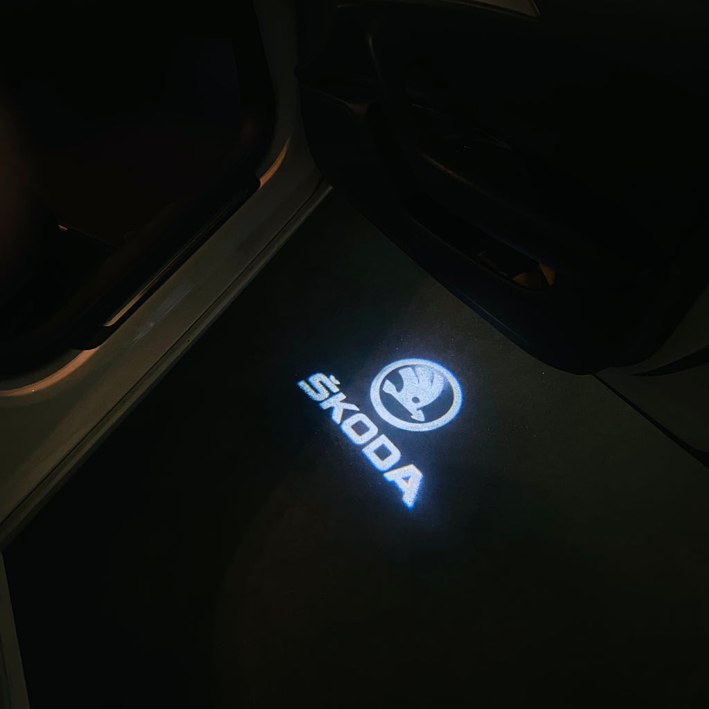 SKODA ORIGINAL LOGO PROJECTOT LIGHTS Nr.09(quantity  1 =  2 Logo Film /  2 door lights)