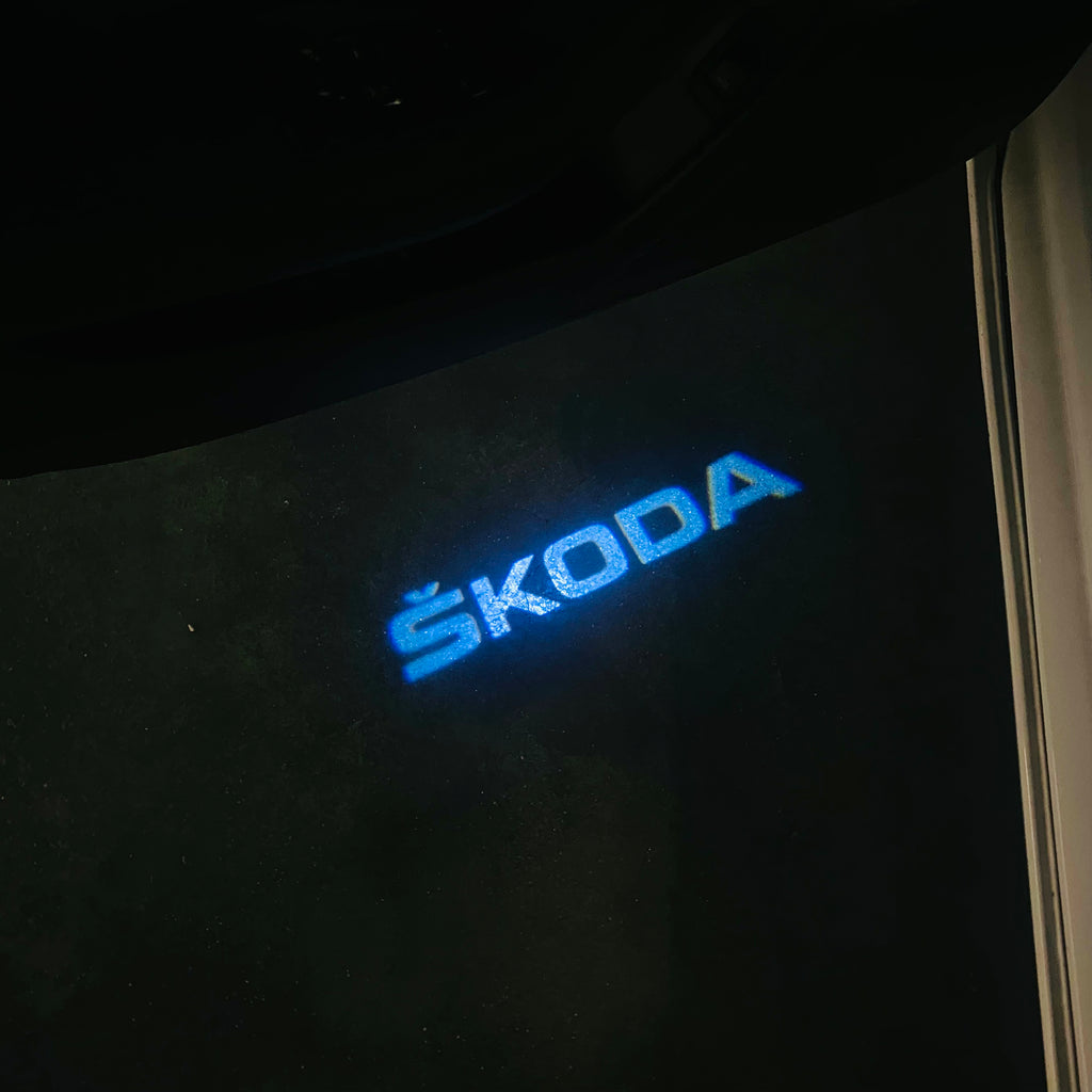 SKODA ORIGINAL LOGO PROJECTOT LIGHTS Nr.39 (quantity  1 =  2 Logo Film /  2 door lights)