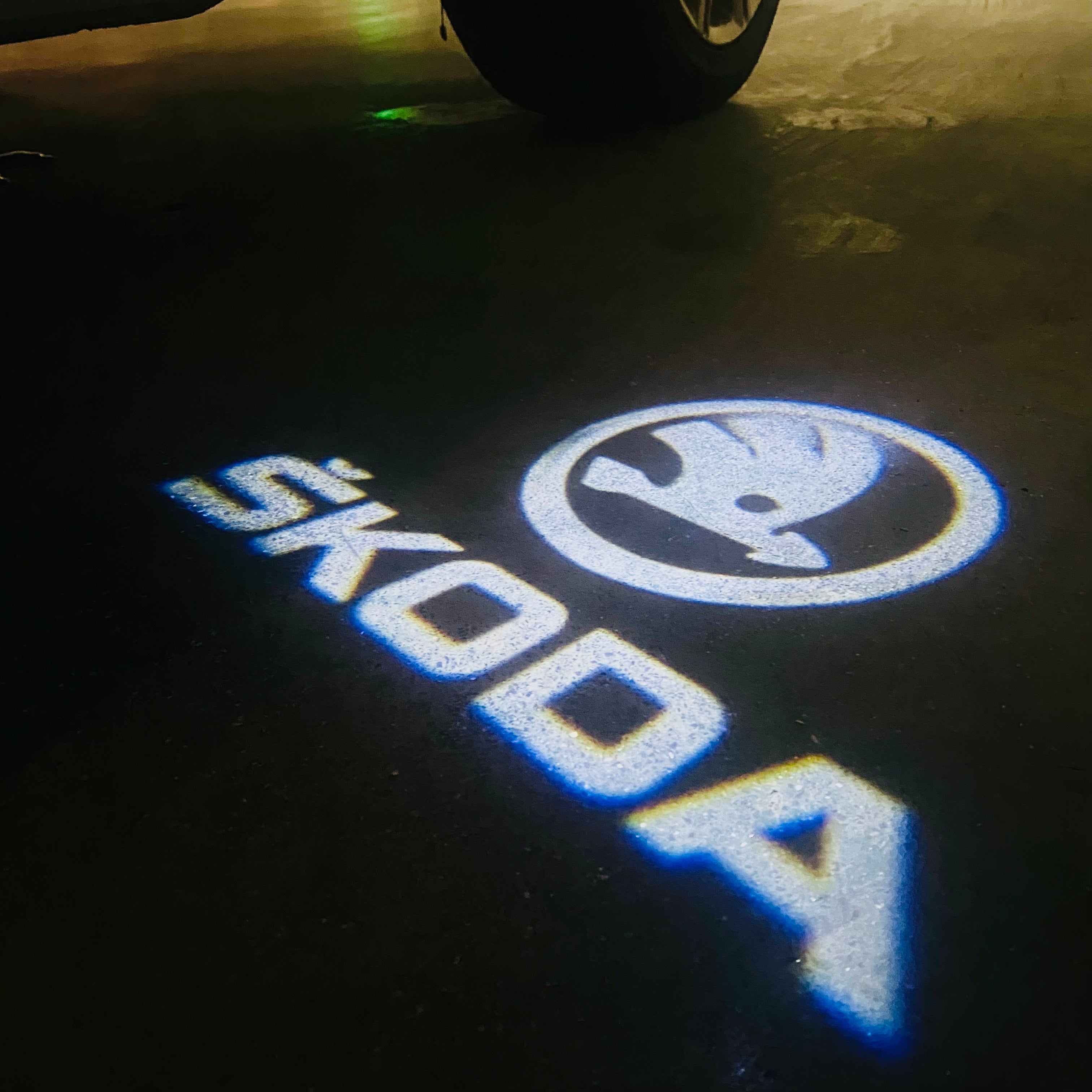 SKODA ORIGINAL LOGO PROJECTOT LIGHTS Nr.09(quantity  1 =  2 Logo Film /  2 door lights)
