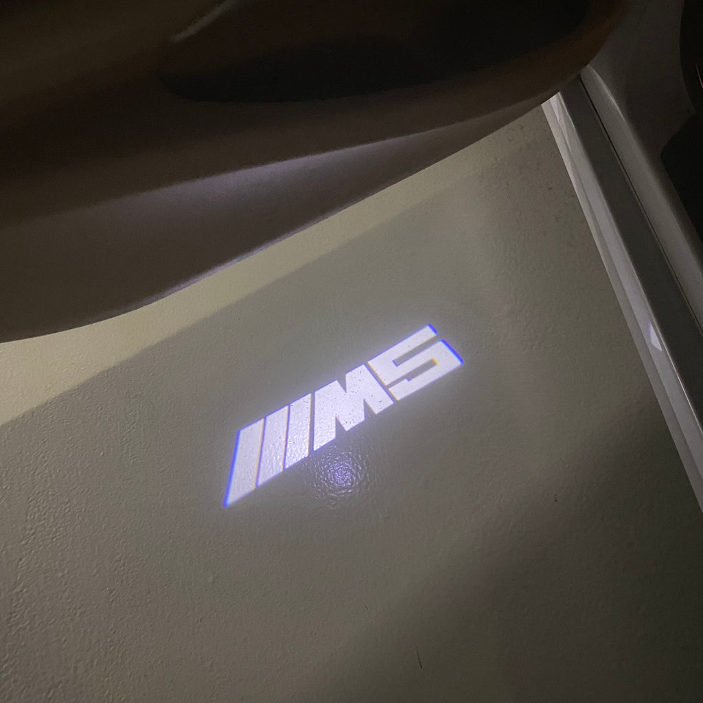 BMW 5 SERIES M5 LOGO PROJECTOT LIGHTS (quantity 1 = 1 sets/2 door lights) Nr.6024q68