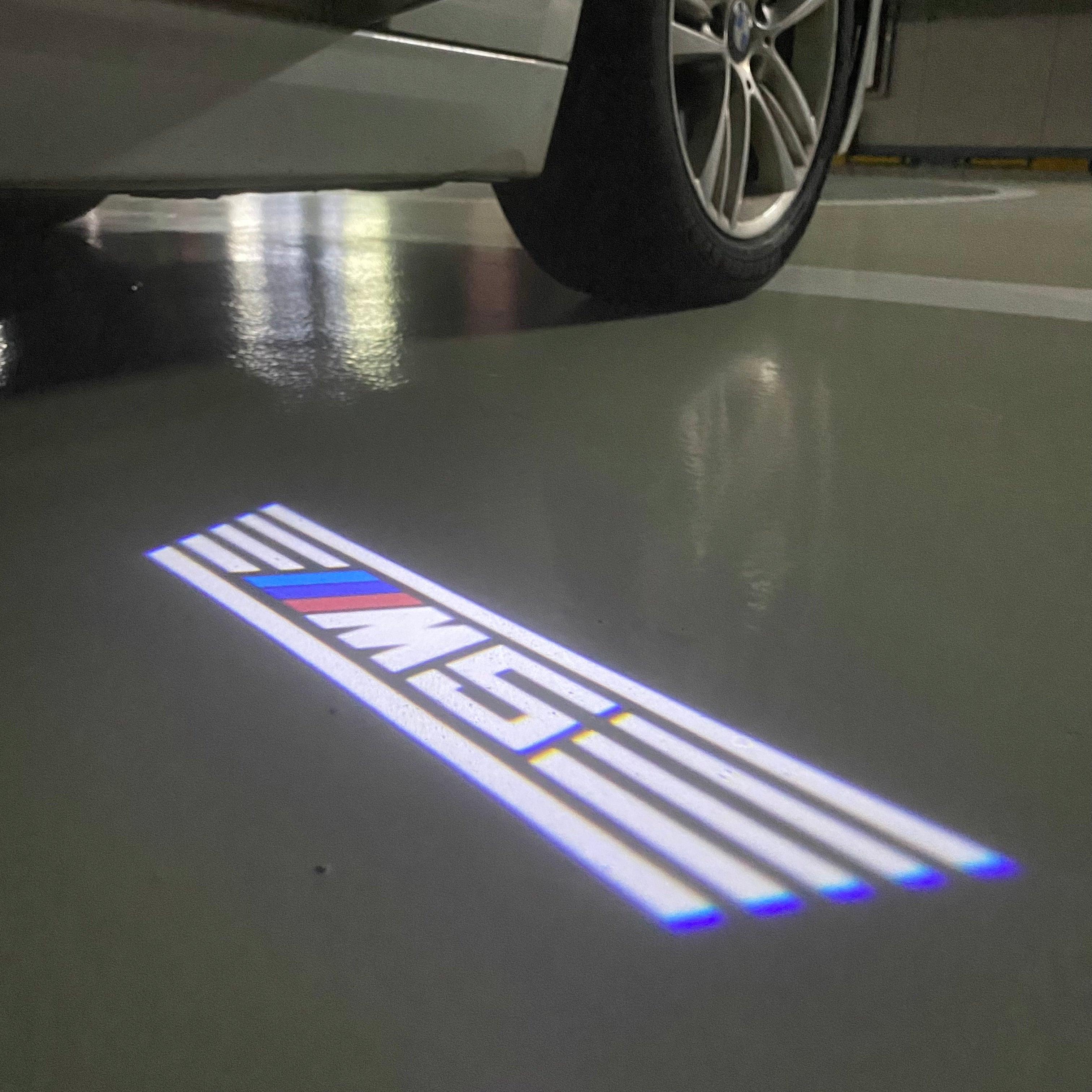 BMW 5 SERIES M5 LOGO PROJECTOT LIGHTS (quantity 1 = 1 sets/2 door lights) Nr.6024q67