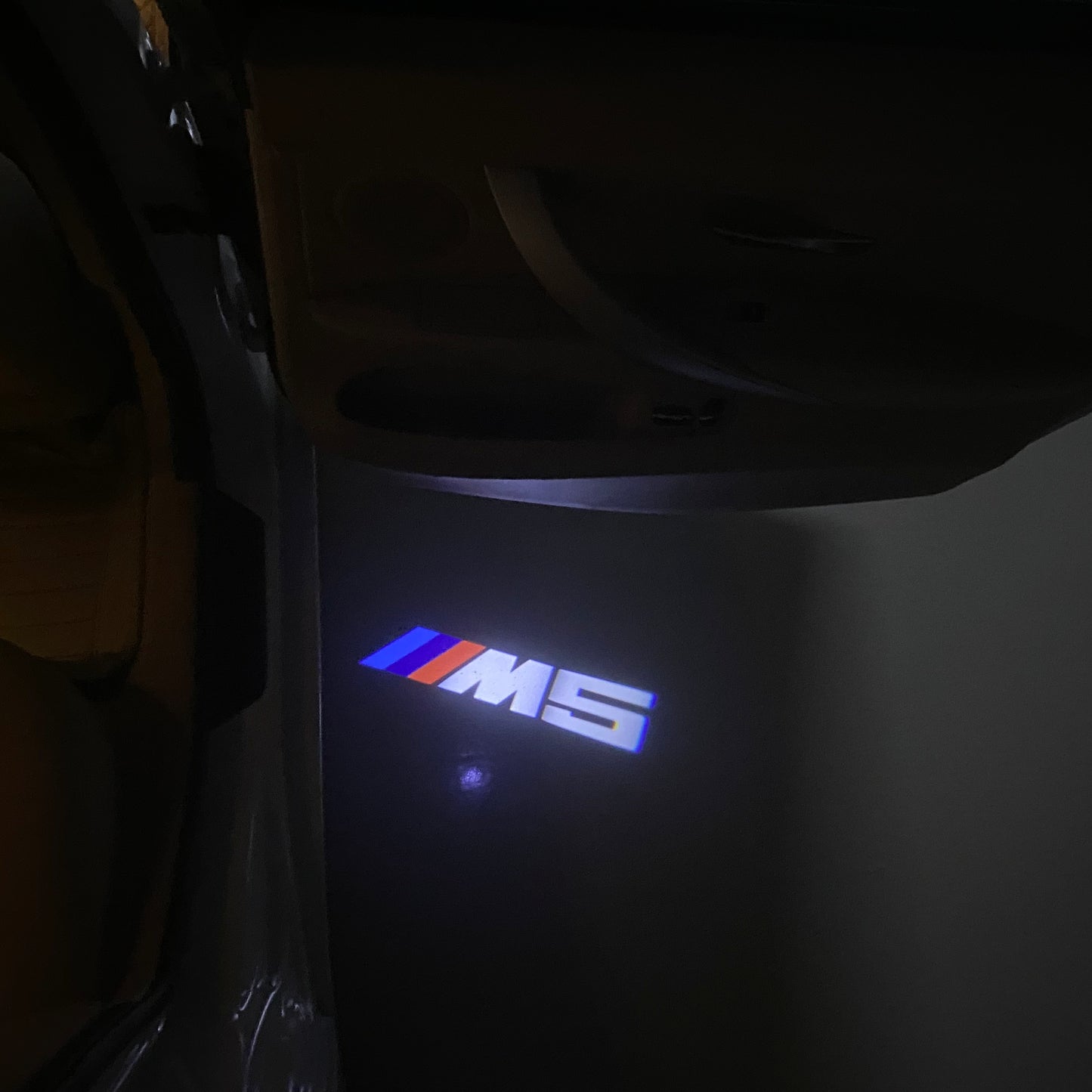 BMW  5 SERIES M5 LOGO PROJECTOT LIGHTS (quantity 1 = 1 sets/2 door lights) Nr.6024q64