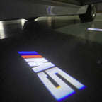 BMW  5 SERIES M5 LOGO PROJECTOT LIGHTS (quantity 1 = 1 sets/2 door lights) Nr.6024q64