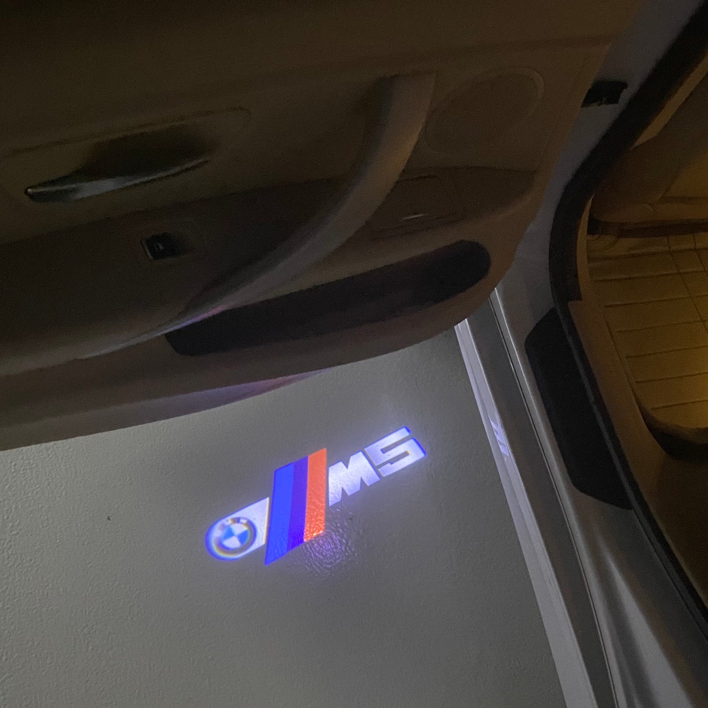 BMW  5 SERIES M5  LOGO PROJECTOT LIGHTS (quantity 1 = 1 sets/2 door lights) Nr.6024q65