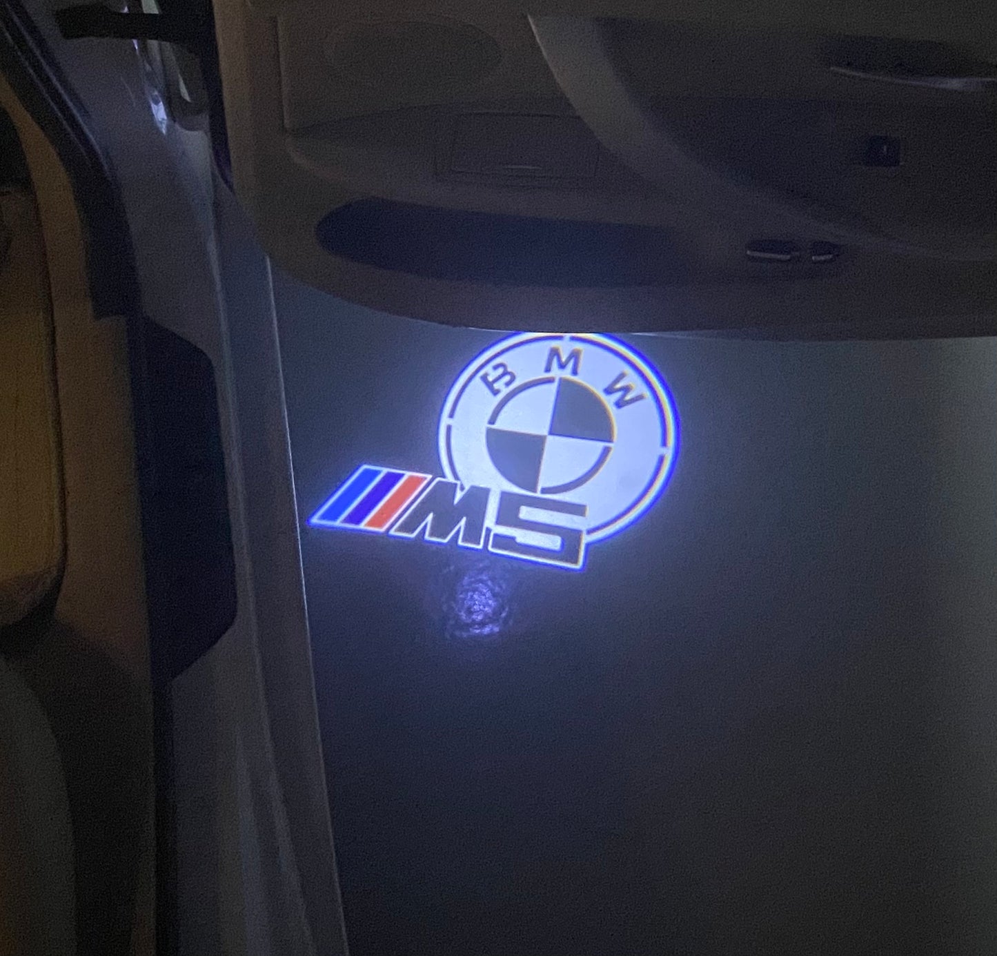 BMW  5 SERIES M5 LOGO PROJECTOT LIGHTS (quantity 1 = 1 sets/2 door lights) Nr.6024q66