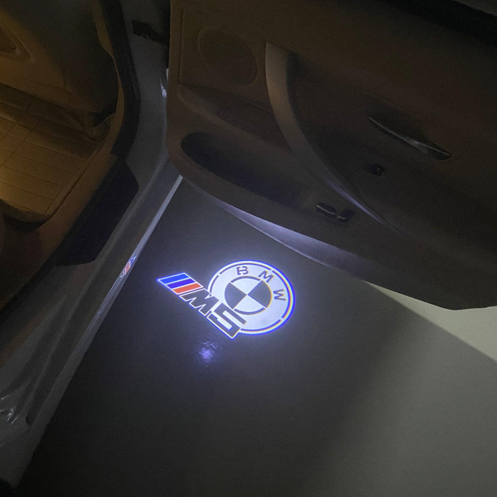 BMW  5 SERIES M5 LOGO PROJECTOT LIGHTS (quantity 1 = 1 sets/2 door lights) Nr.6024q66